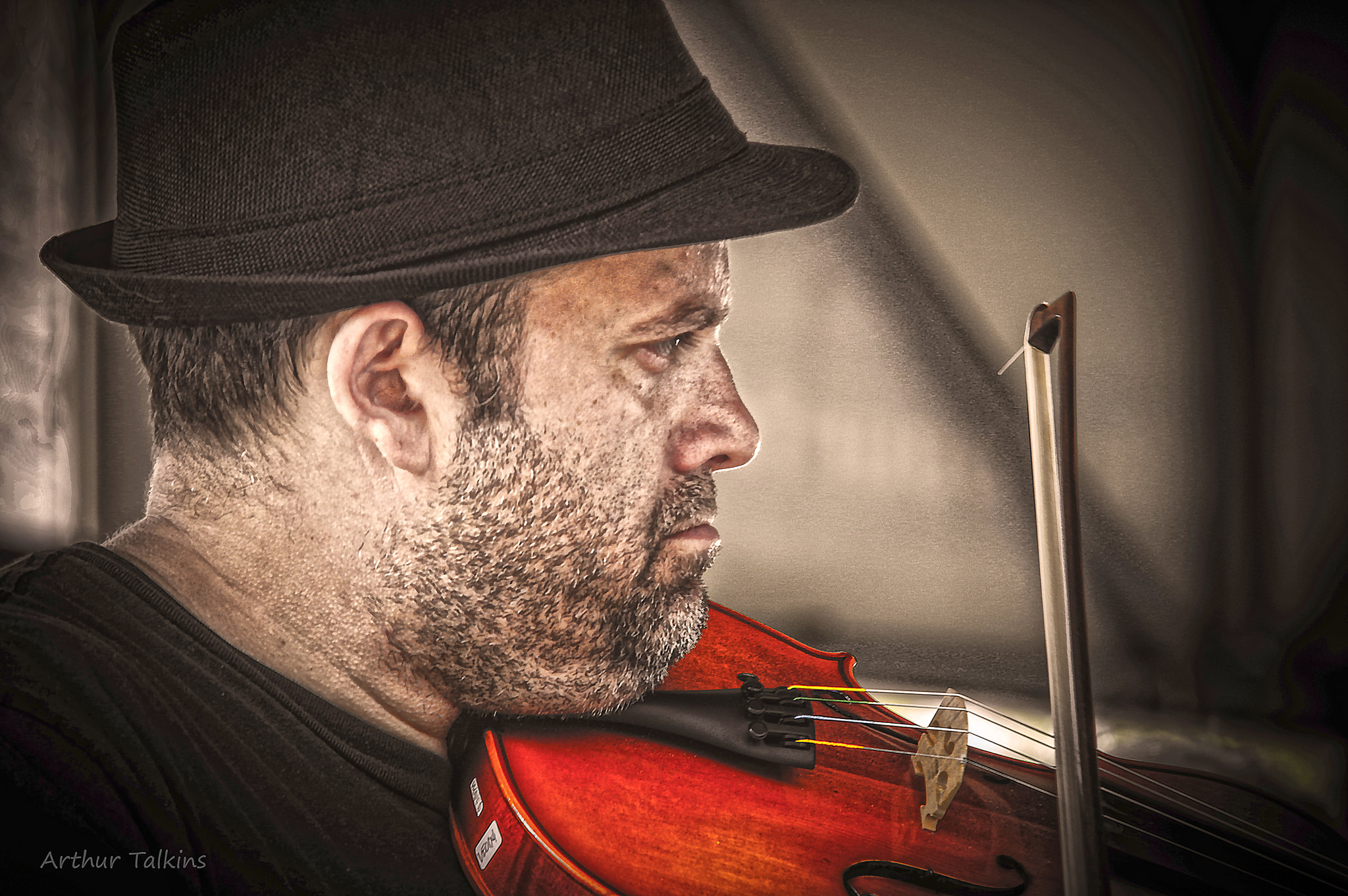 Sigma 70-200mm F2.8 EX DG Macro HSM II sample photo. Profile of a fiddling man.... photography
