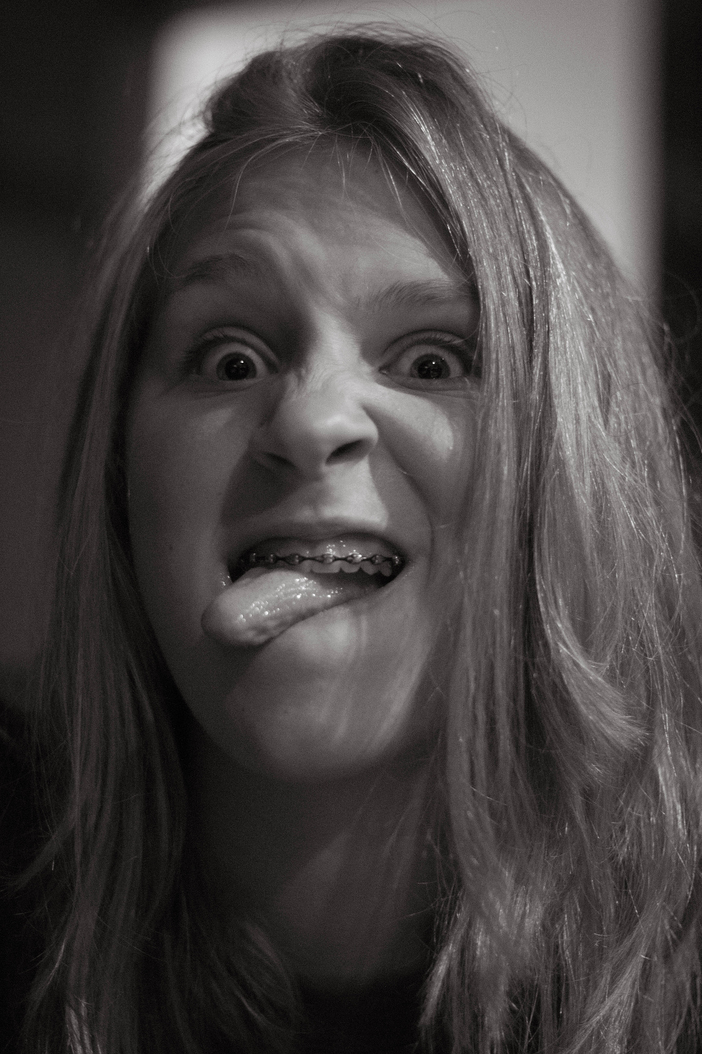 Canon EOS 650D (EOS Rebel T4i / EOS Kiss X6i) + Canon EF 50mm F1.8 II sample photo. Girl with braces photography