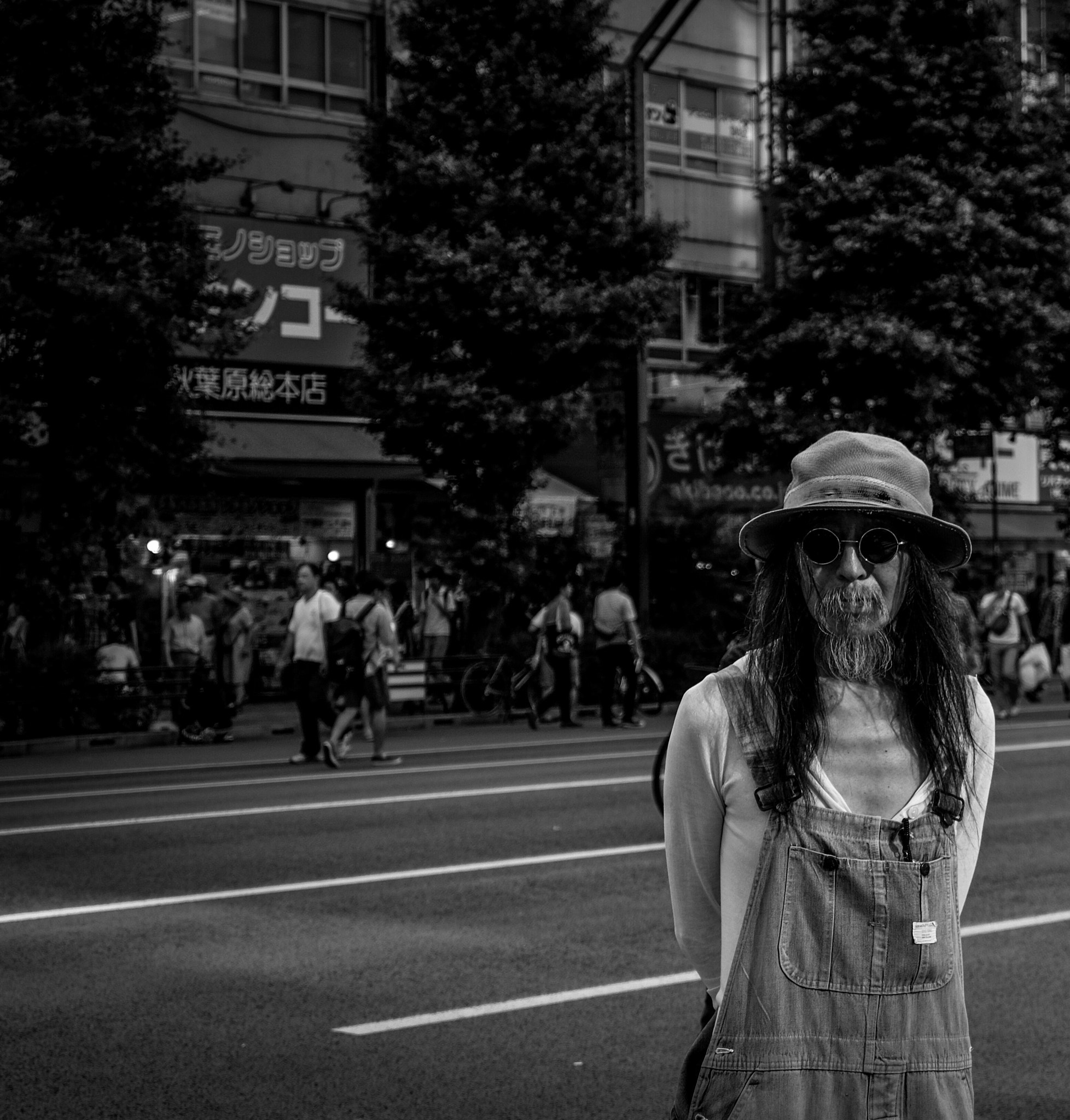 Fujifilm X-T10 + Fujifilm XC 16-50mm F3.5-5.6 OIS sample photo. Saw this man just standing in the middle of the st ... photography