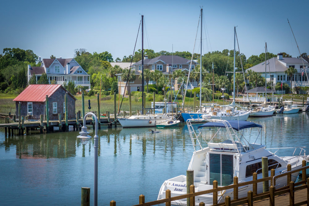 Sony Alpha NEX-7 + E 30mm F1.4 sample photo. "tony bourdain's fish shack and the dolphin" photography