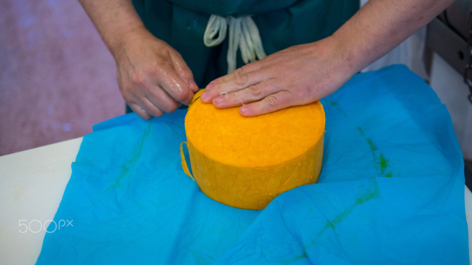 Panasonic Lumix DMC-GH4 + Panasonic Leica DG Summilux 25mm F1.4 II ASPH sample photo. A cheese maker preparing his next creation photography