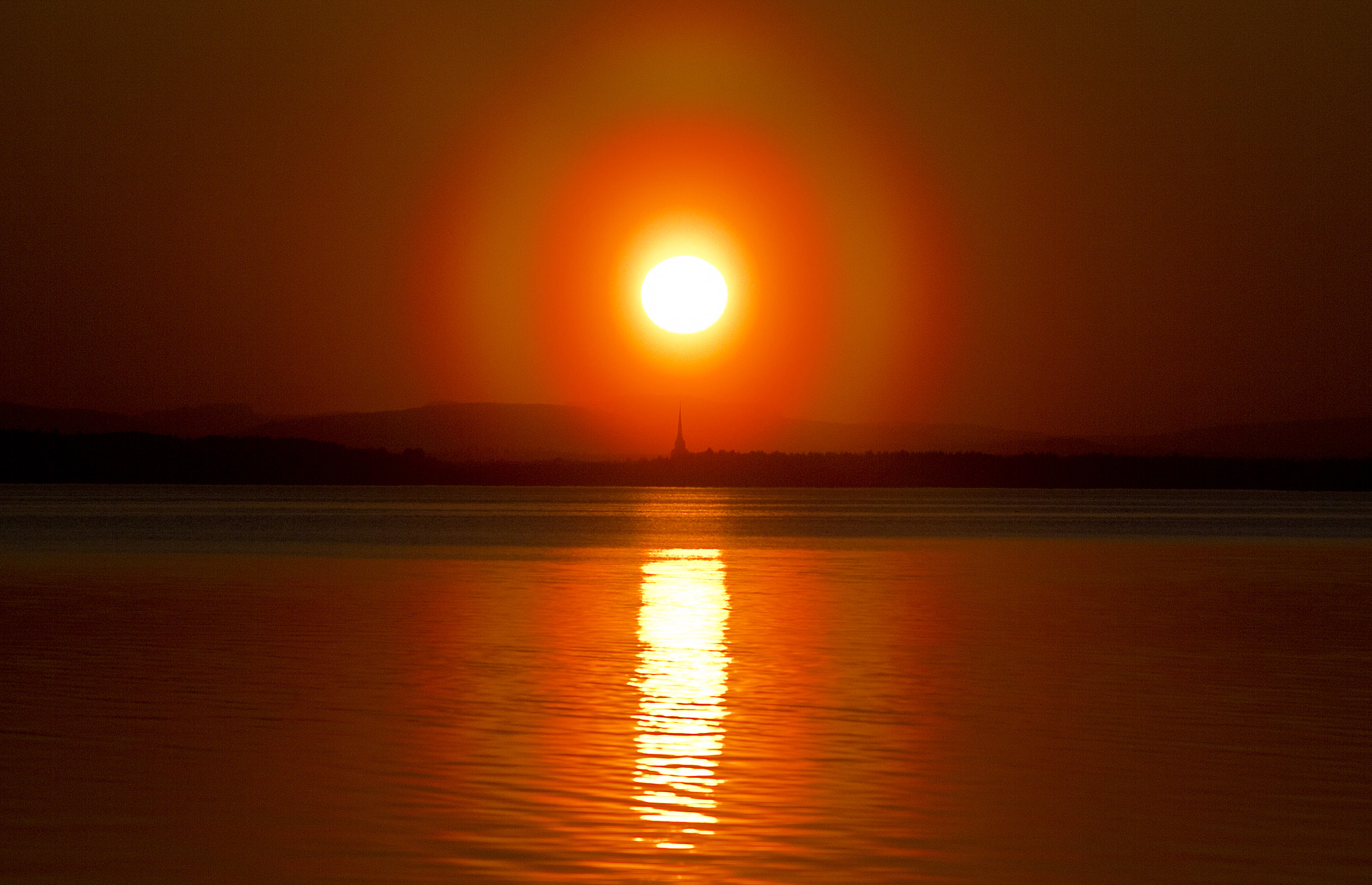 Sigma 50-200mm F4-5.6 DC OS HSM sample photo. Sunset halo photography