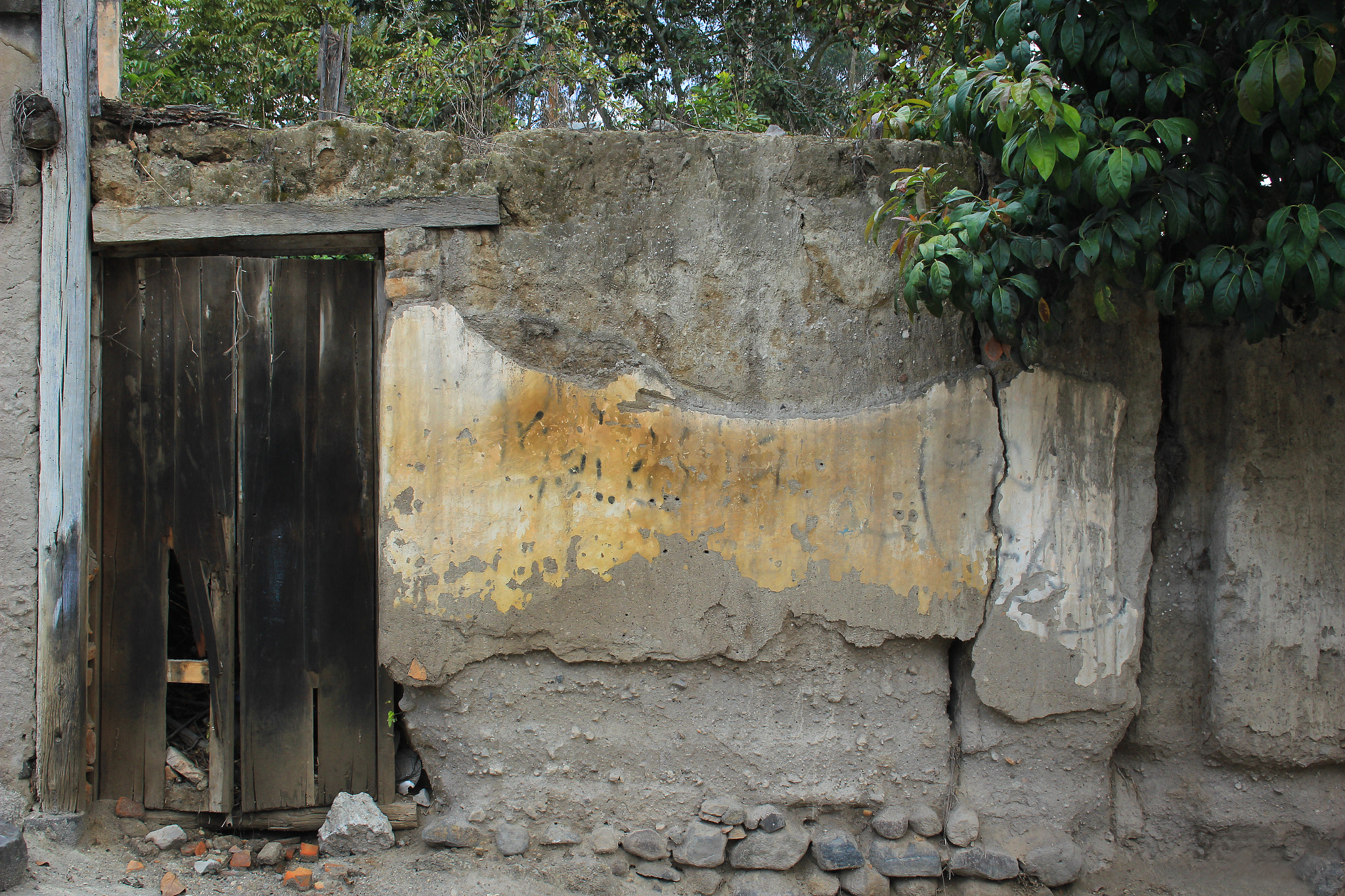 Canon EF-S 18-55mm F3.5-5.6 II sample photo. Adobe wall and weathered door photography