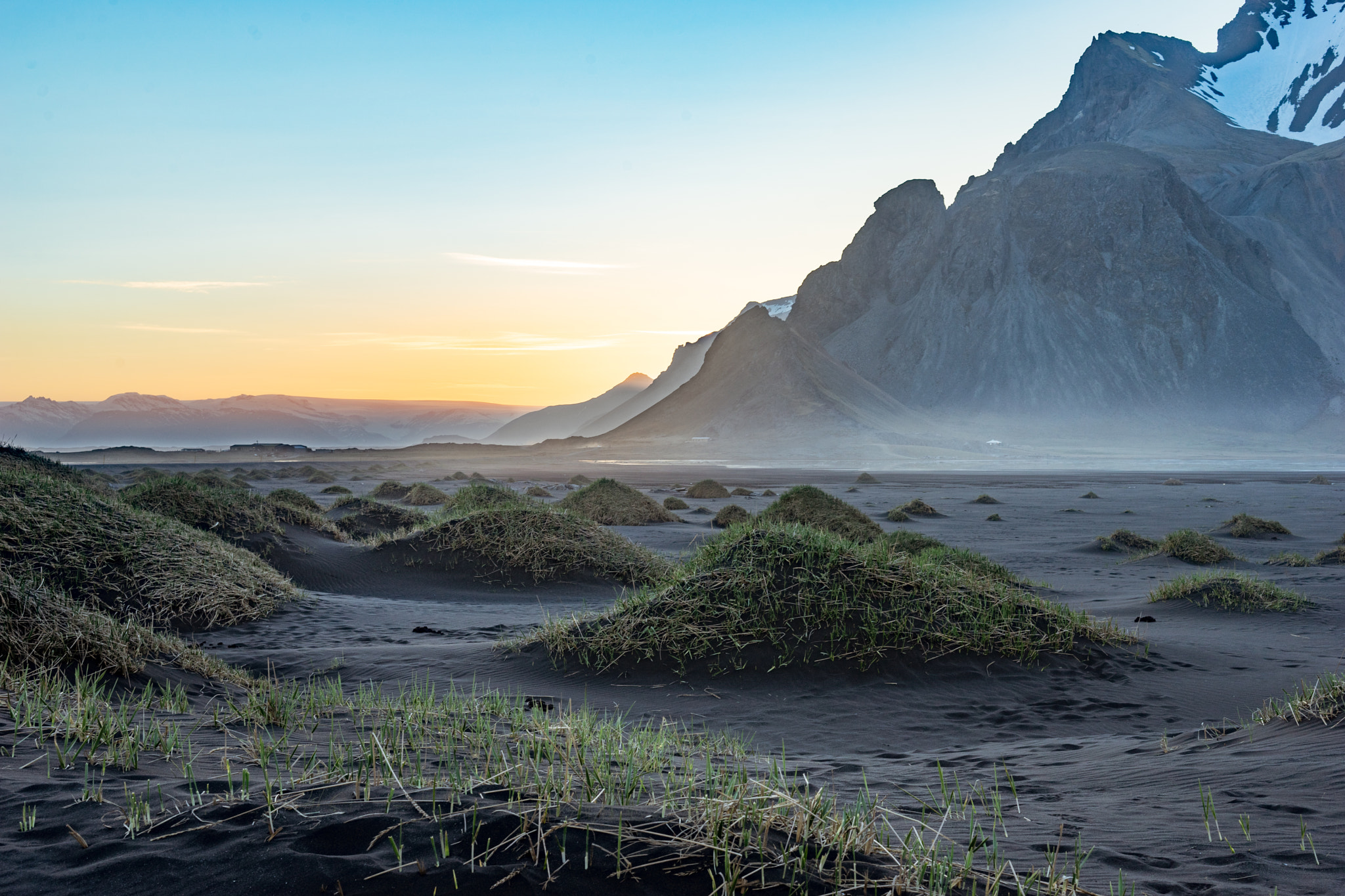 E 50mm F2 sample photo. Black sand to foggy mountain photography