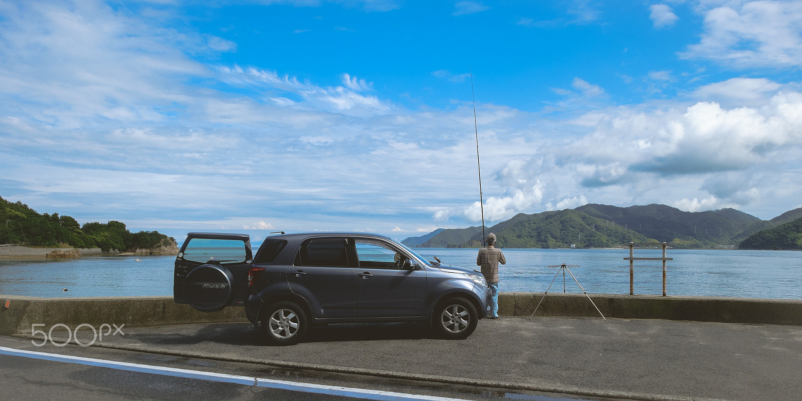 Fujifilm X-M1 + Fujifilm XF 14mm F2.8 R sample photo. Fisherman photography