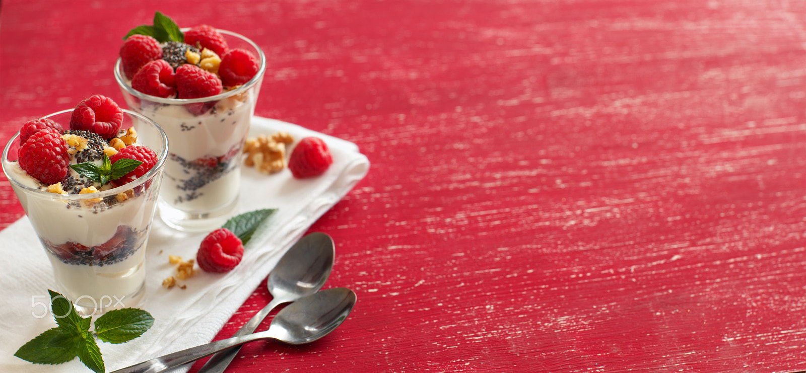 Canon EOS 650D (EOS Rebel T4i / EOS Kiss X6i) + Canon EF 50mm F1.2L USM sample photo. Yogurt with chia seeds, walnuts and raspberries photography