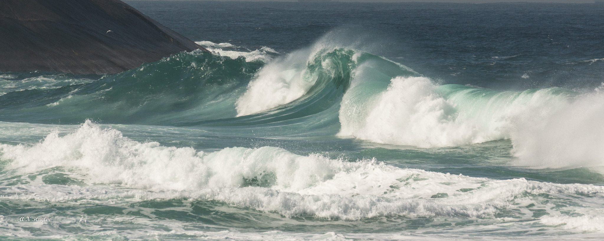 Sony 70-300mm F4.5-5.6 G SSM sample photo. Big são conrado surf in sun photography