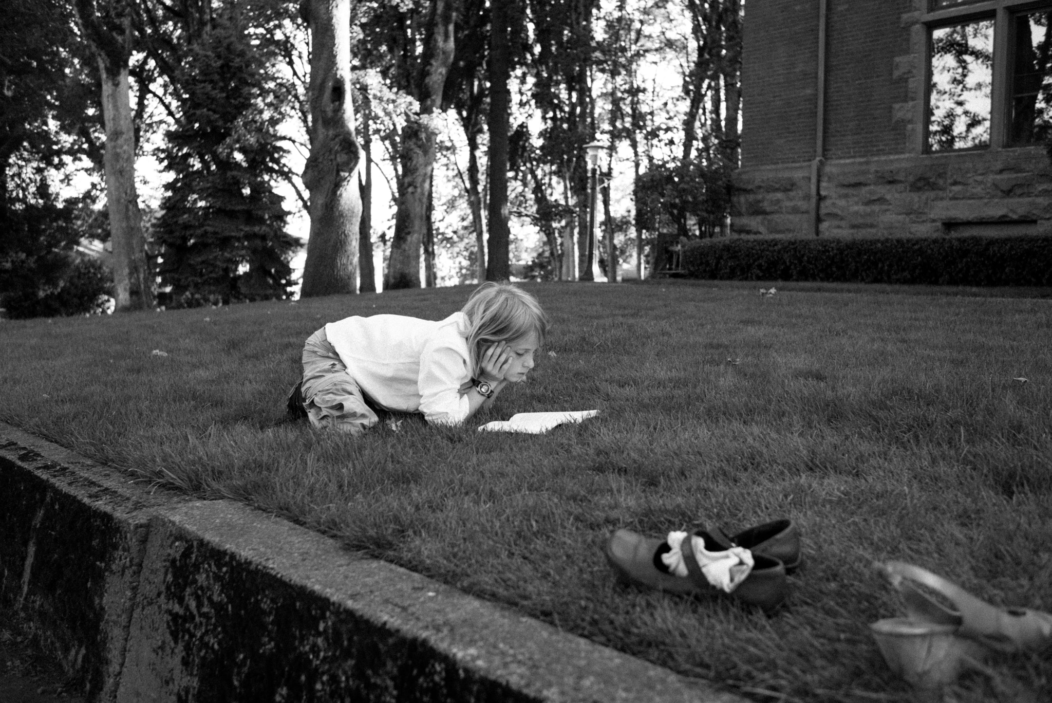 Leica Summarit-M 35mm F2.4 ASPH sample photo. Boy reading. photography