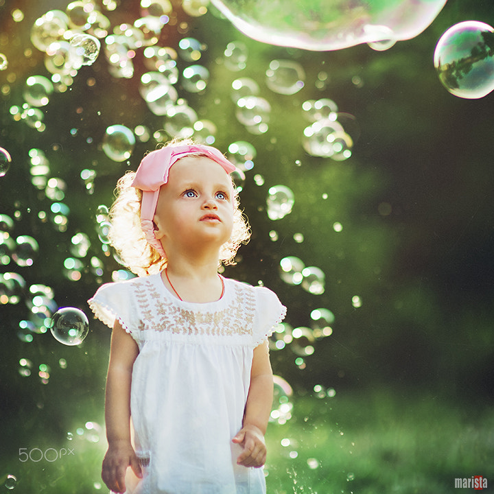 Nikon D7000 + Sigma 85mm F1.4 EX DG HSM sample photo. Girl with soap bubbles photography