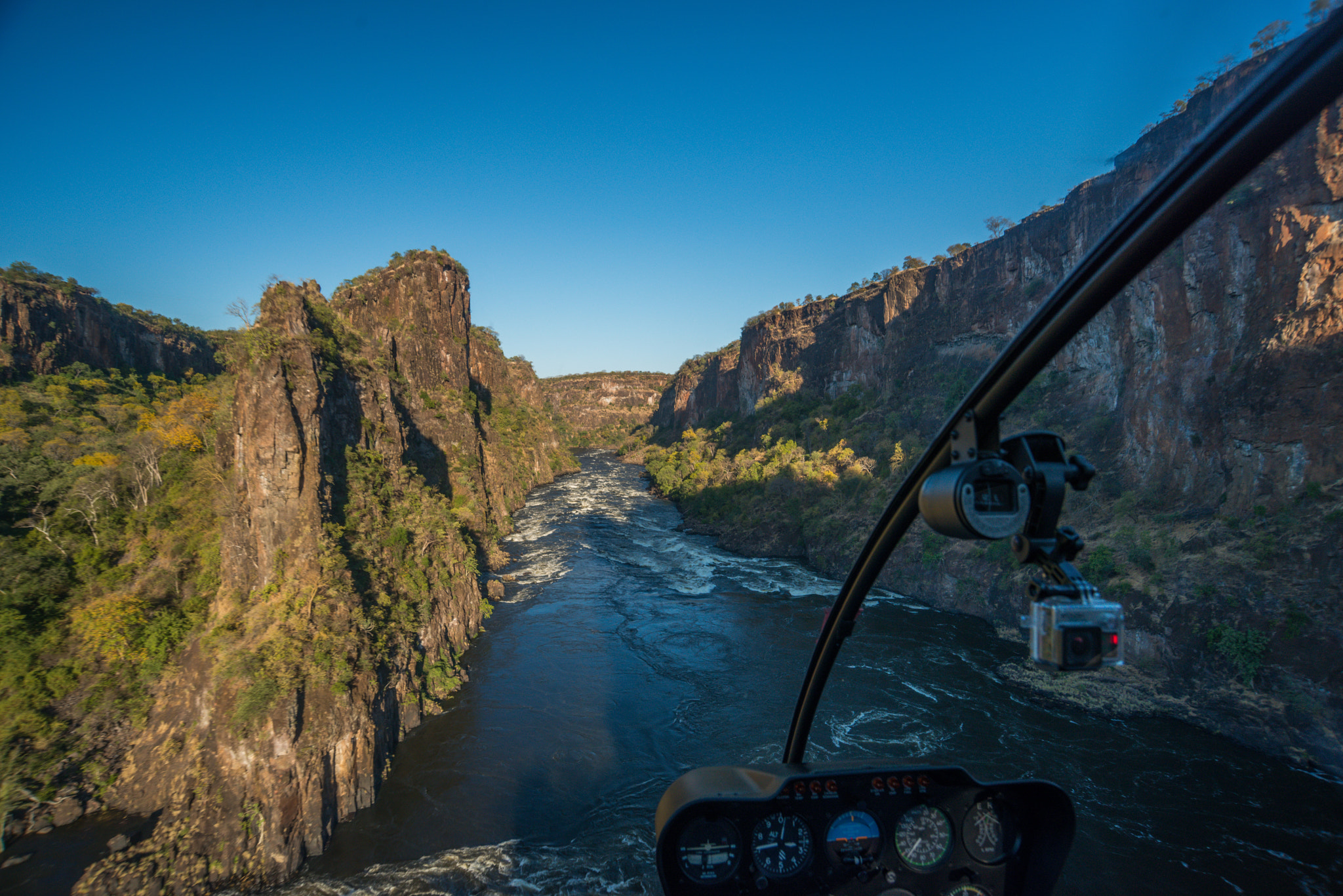 Nikon D800 + Nikon AF Nikkor 18-35mm F3.5-4.5D IF ED sample photo. Aerial view from helicopter of sunlit gorge photography