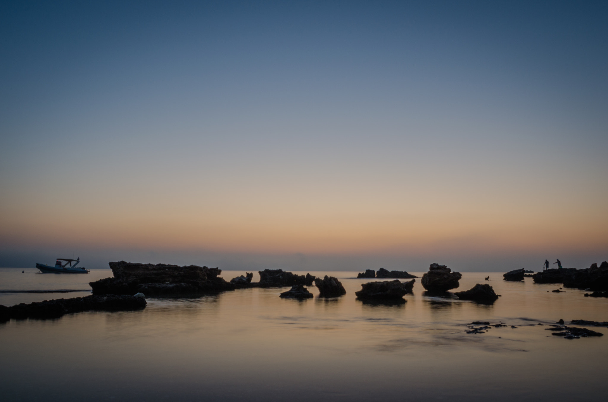 Nikon D5100 + Sigma 18-50mm F2.8-4.5 DC OS HSM sample photo. Rocks in the water photography