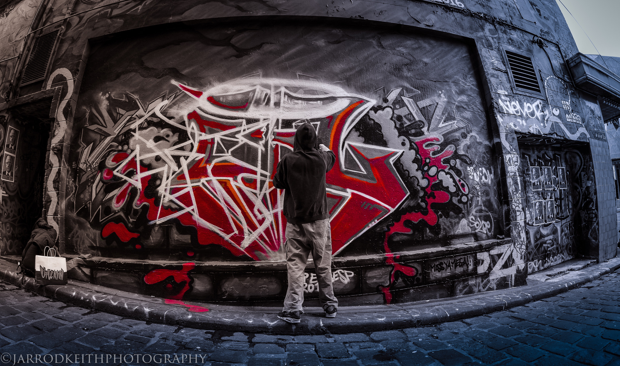 Olympus OM-D E-M1 + OLYMPUS M.8mm F1.8 sample photo. Graffiti artist in melbourne, australia photography