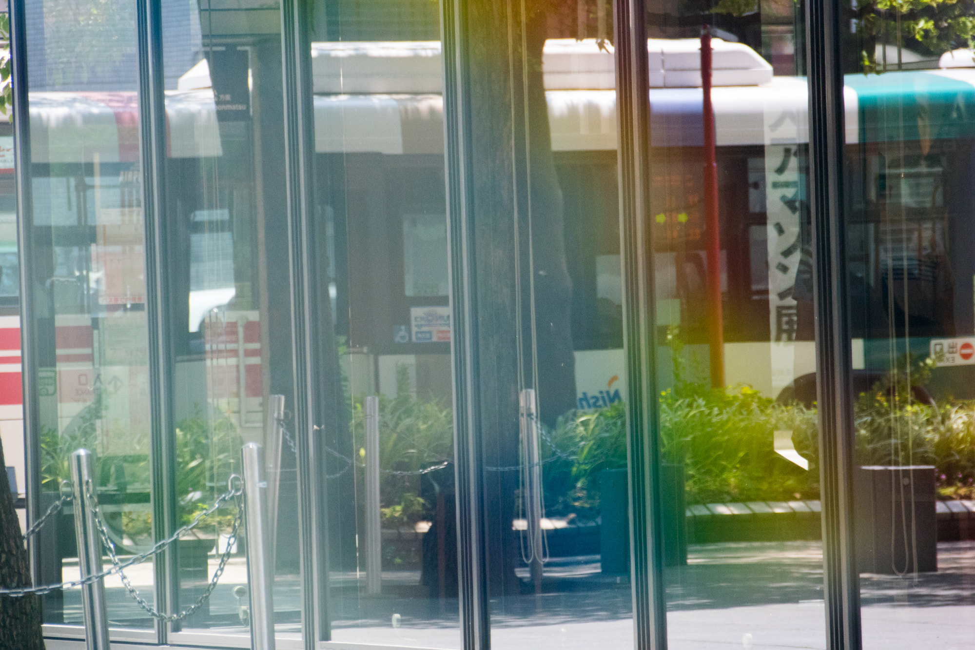 Nikon 1 V3 sample photo. Bus stop rainbow photography