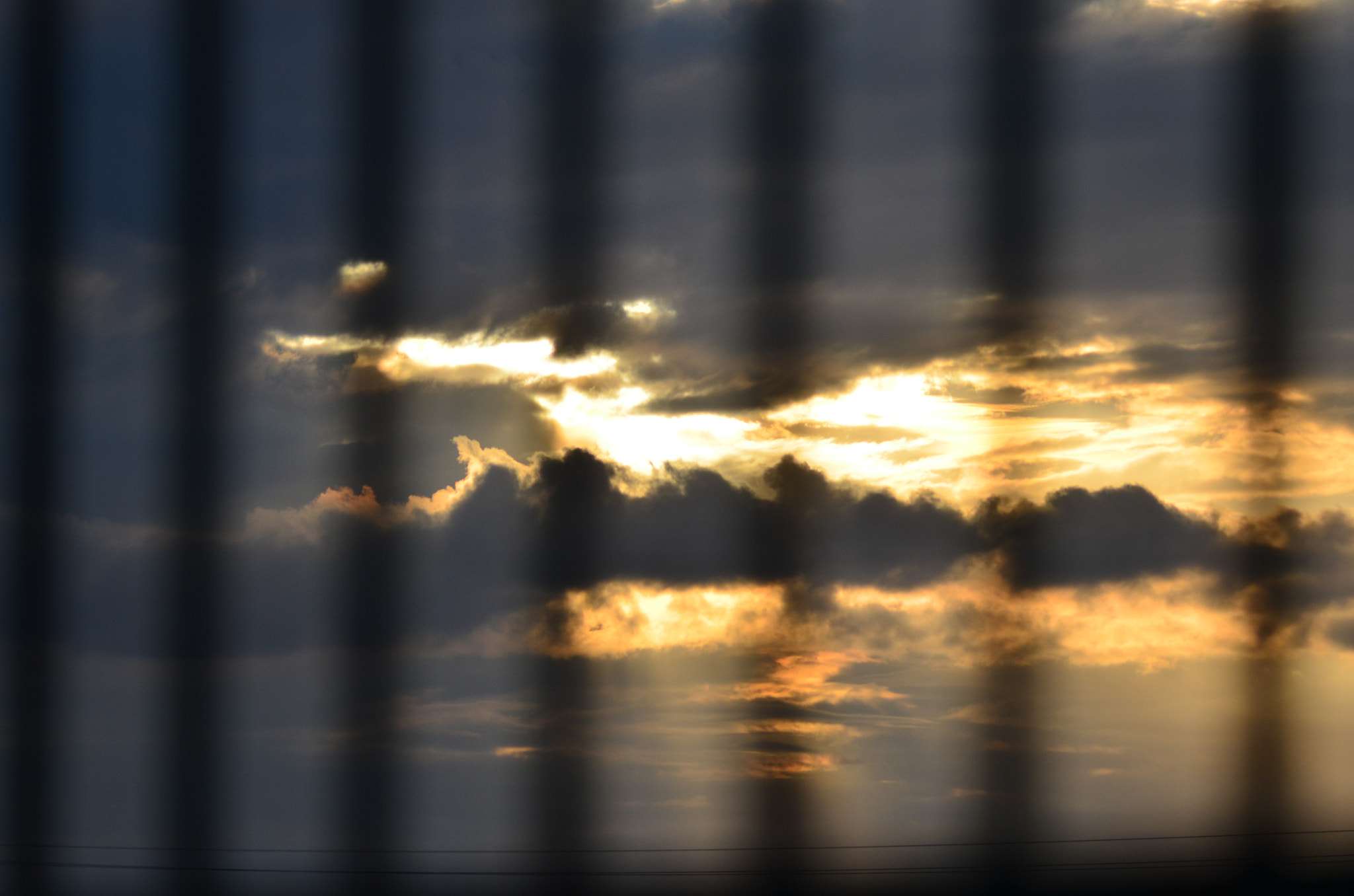 Sigma 120-400mm F4.5-5.6 DG OS HSM sample photo. Sunset between the bars photography