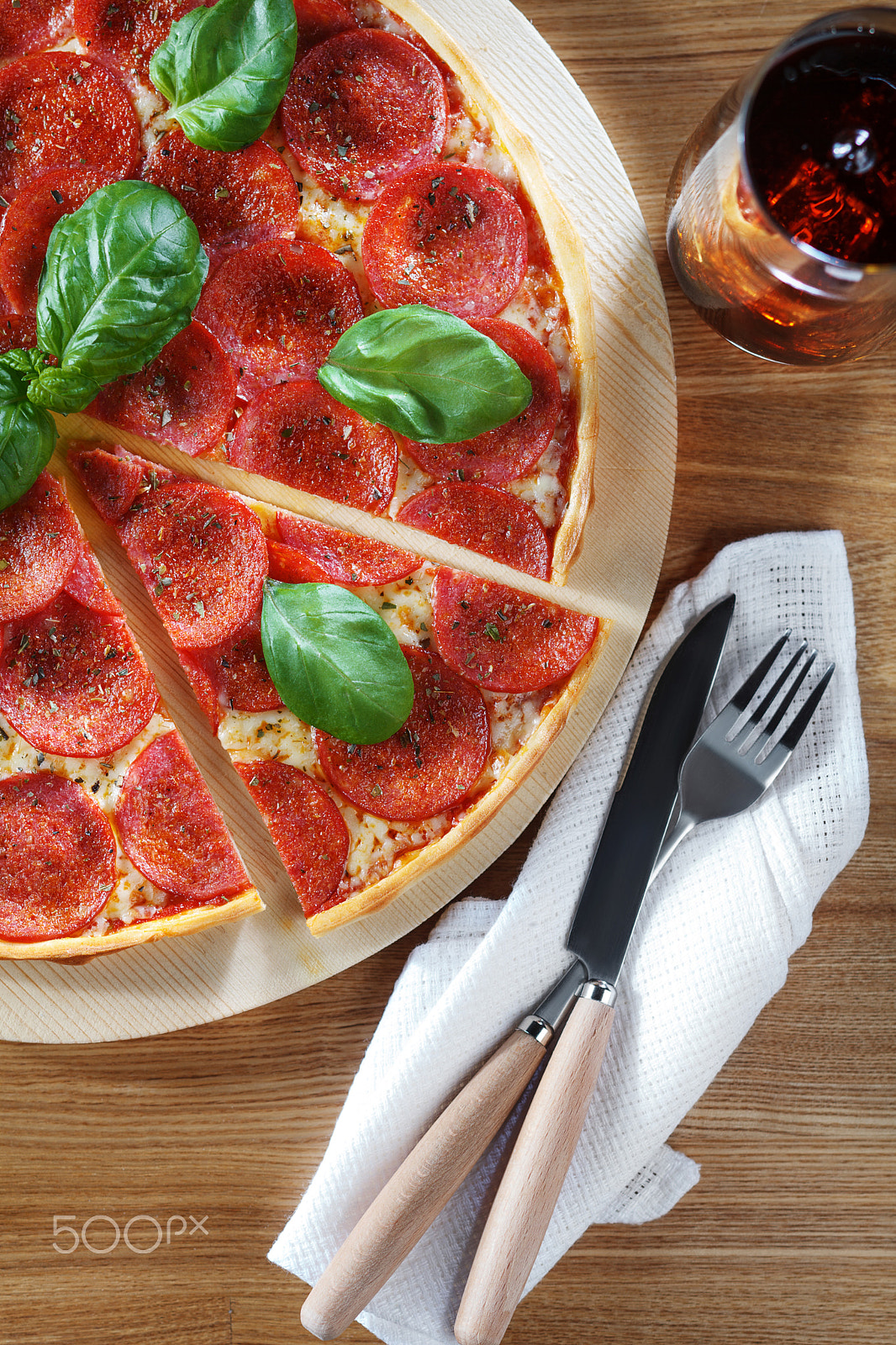 Canon TS-E 90mm F2.8 Tilt-Shift sample photo. Overhead view of pizza slice photography