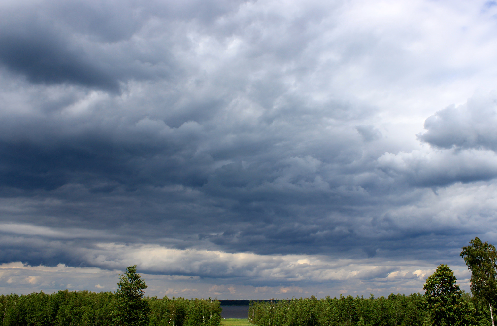 Canon EF-S 18-55mm F3.5-5.6 III sample photo. Groomy sky photography