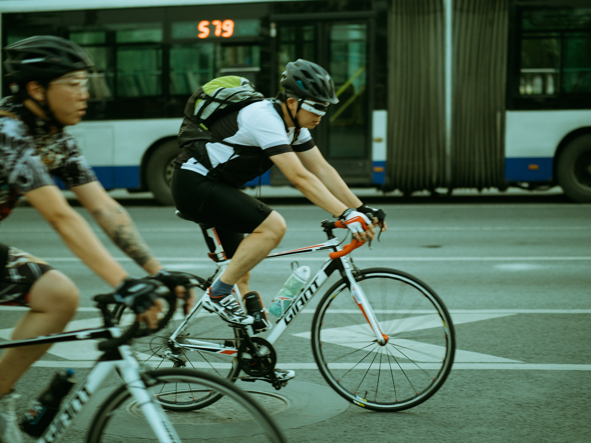Panasonic Leica DG Nocticron 42.5mm F1.2 ASPH OIS sample photo. Bicyclers photography