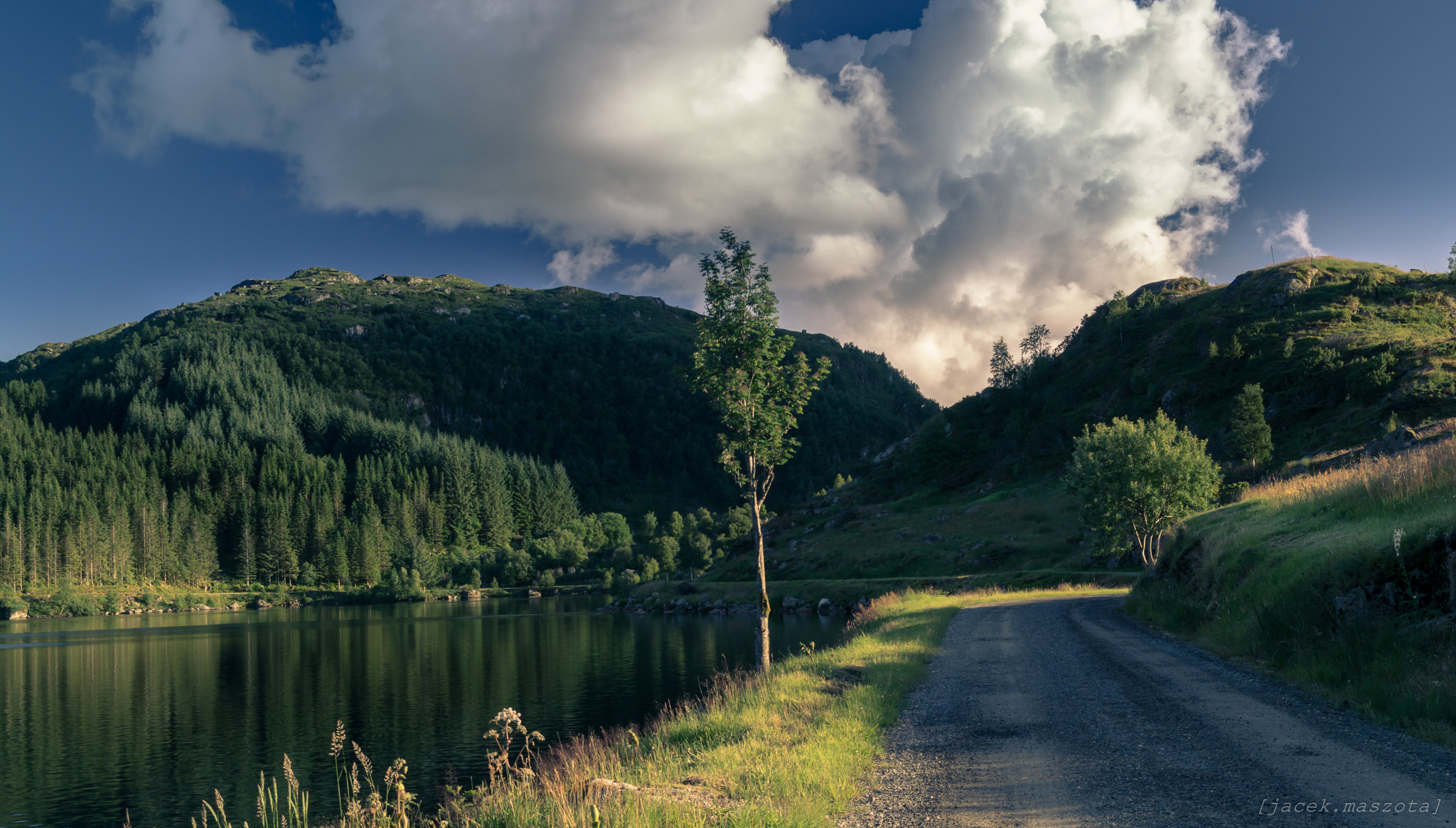 Samsung NX300M sample photo. Road next to lake photography