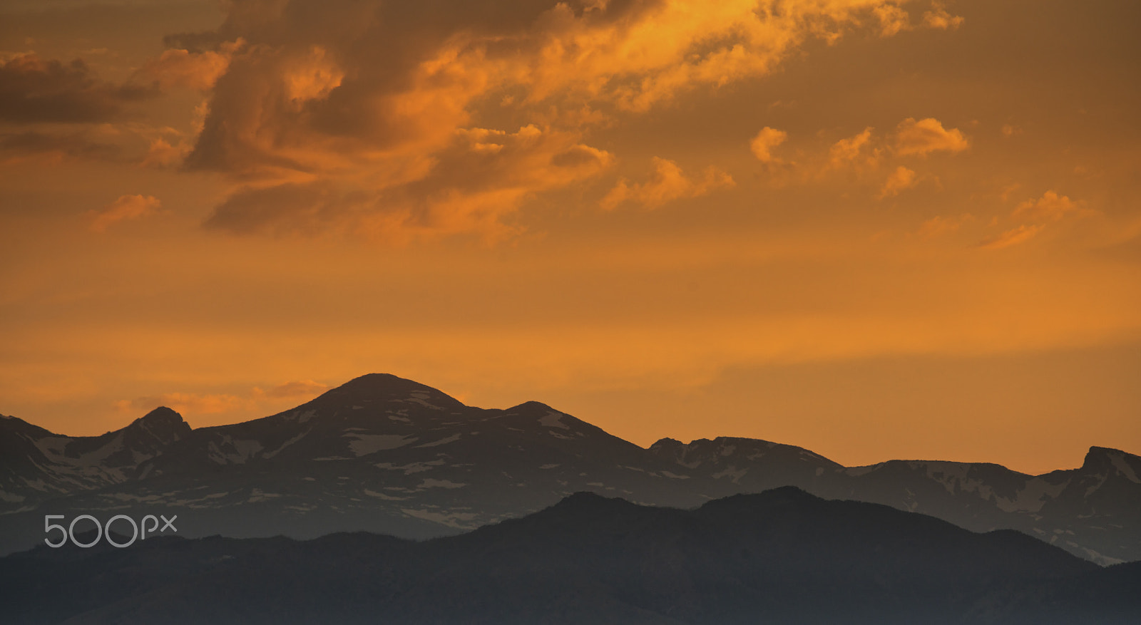 Canon EF 100-400mm F4.5-5.6L IS USM sample photo. Silhouette of mountains against sunset sky photography