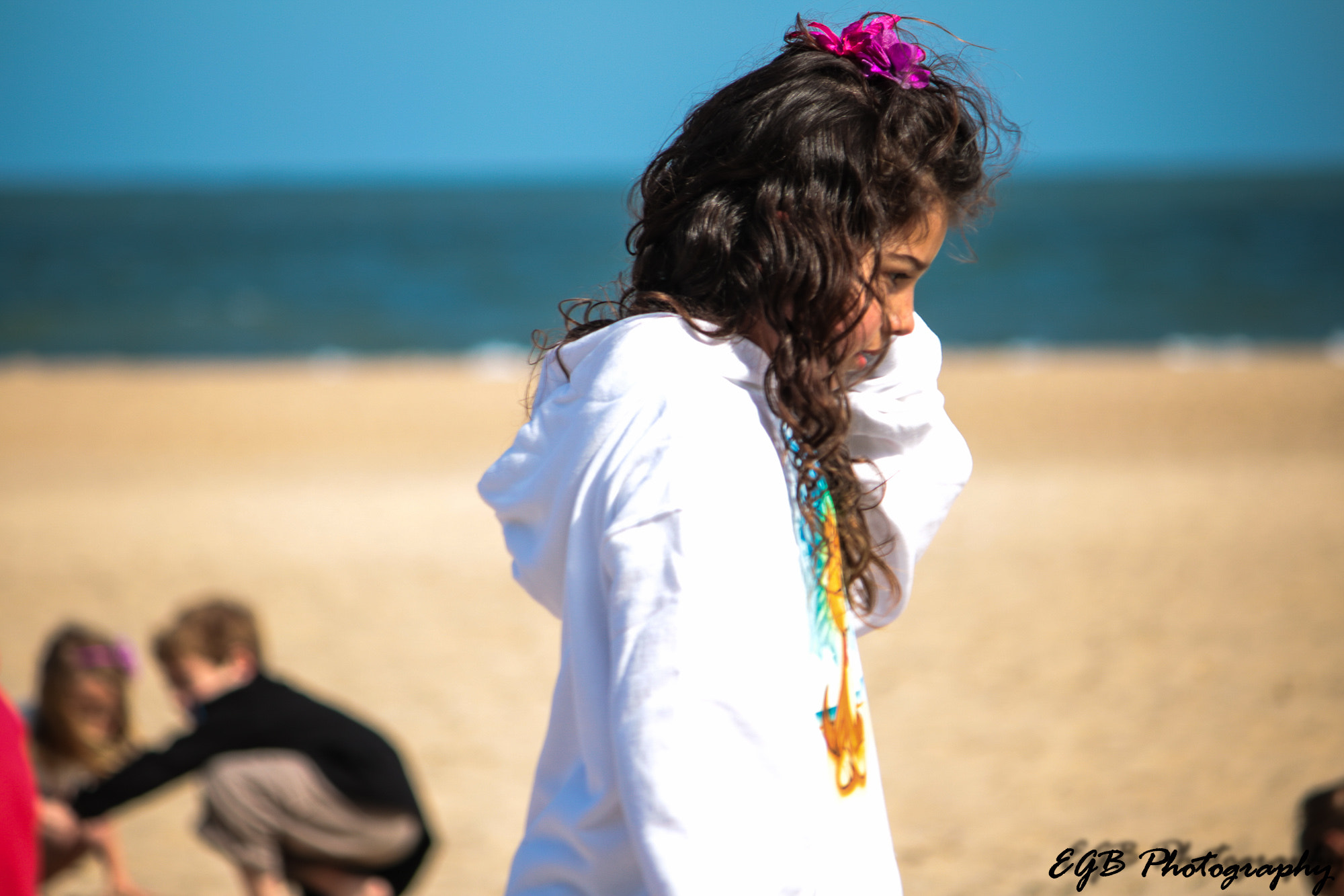 Canon EF-S 55-250mm F4-5.6 IS sample photo. Girl on the beach photography
