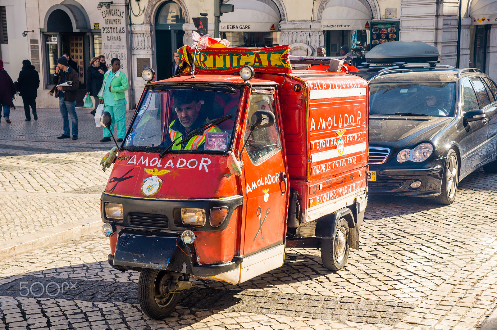 Sony SLT-A57 + Sony DT 16-105mm F3.5-5.6 sample photo. Lisboa, portugal - november 28: old knife-grinder vehicle in rossio square on november 28, 2013... photography
