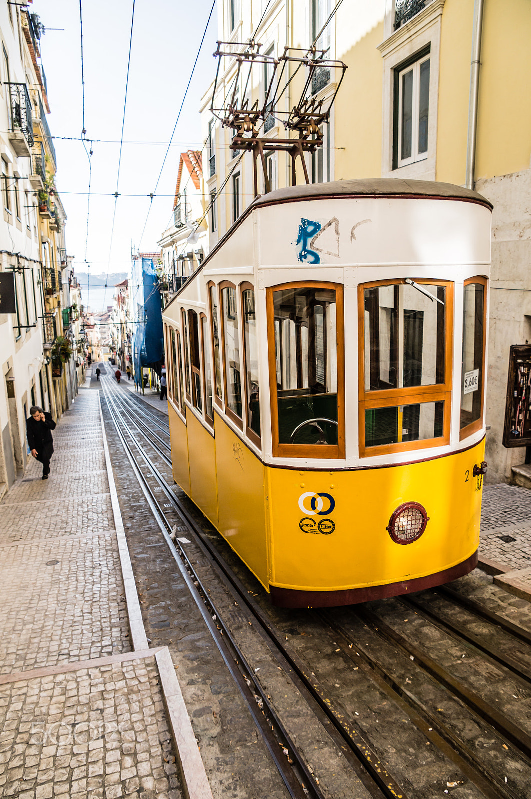 Sony SLT-A57 + Sony DT 16-105mm F3.5-5.6 sample photo. Lisboa, portugal - november 28: traditional yellow tram/funicular (bica elevator) on november 28,... photography