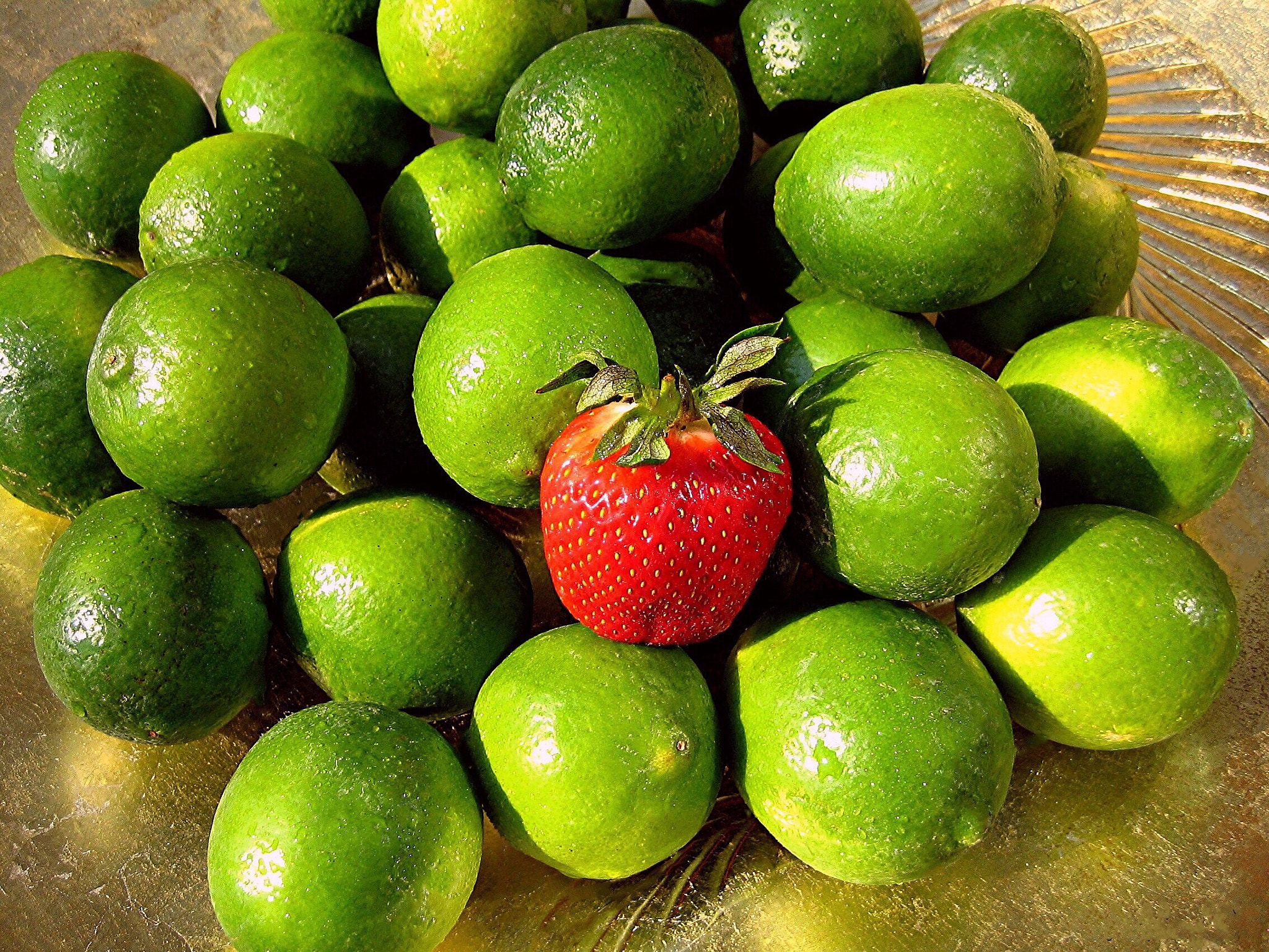 Canon POWERSHOT SD300 sample photo. A strawberry & limes photography