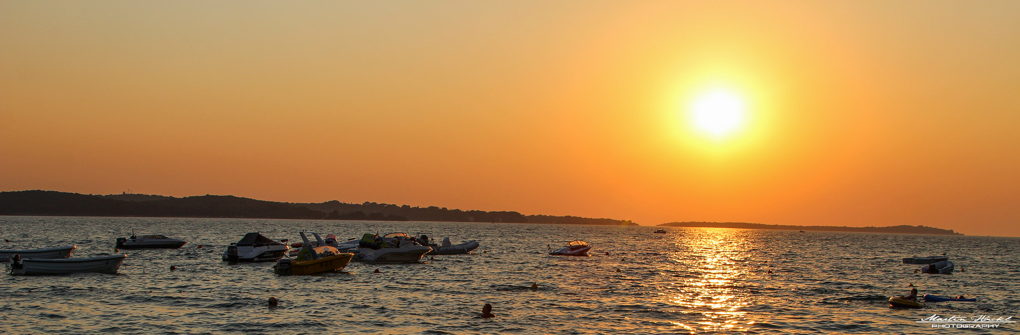 Canon EF 28-135mm F3.5-5.6 IS USM sample photo. Sunset over beach photography