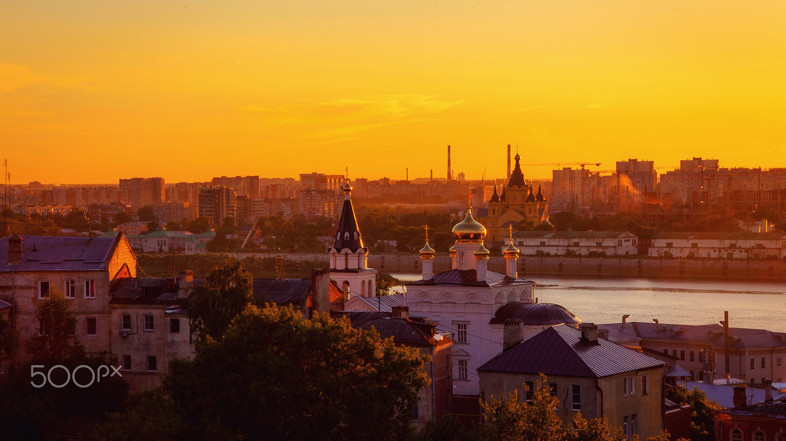Canon EF 35-135mm f/4-5.6 USM sample photo. City in evening sunshine photography