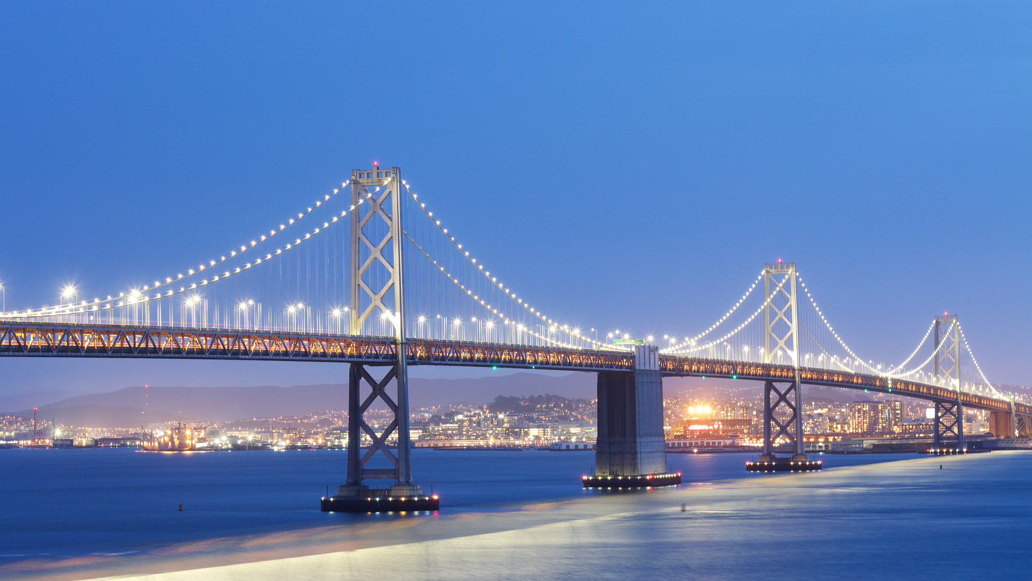 Canon EOS M + Canon EF 50mm F1.8 II sample photo. The bridge connecting san francisco to oakland. photography