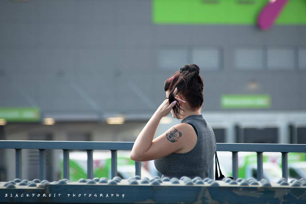 Canon EOS 50D + Canon EF 75-300mm F4.0-5.6 IS USM sample photo. Grey woman photography
