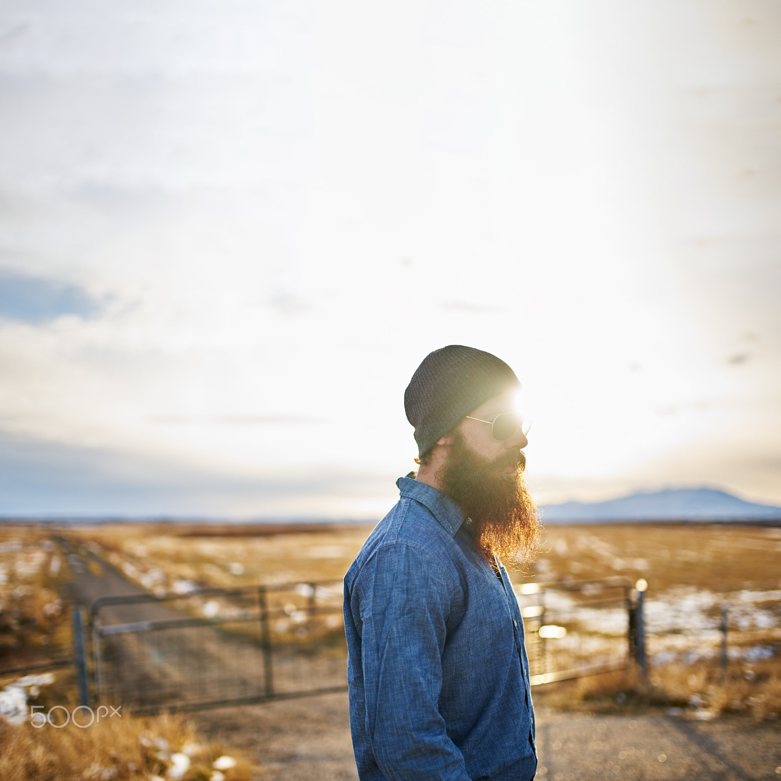 35mm F1.4 G SSM sample photo. Bearded man wondering around the middle of nowhere in nevada at sunset photography