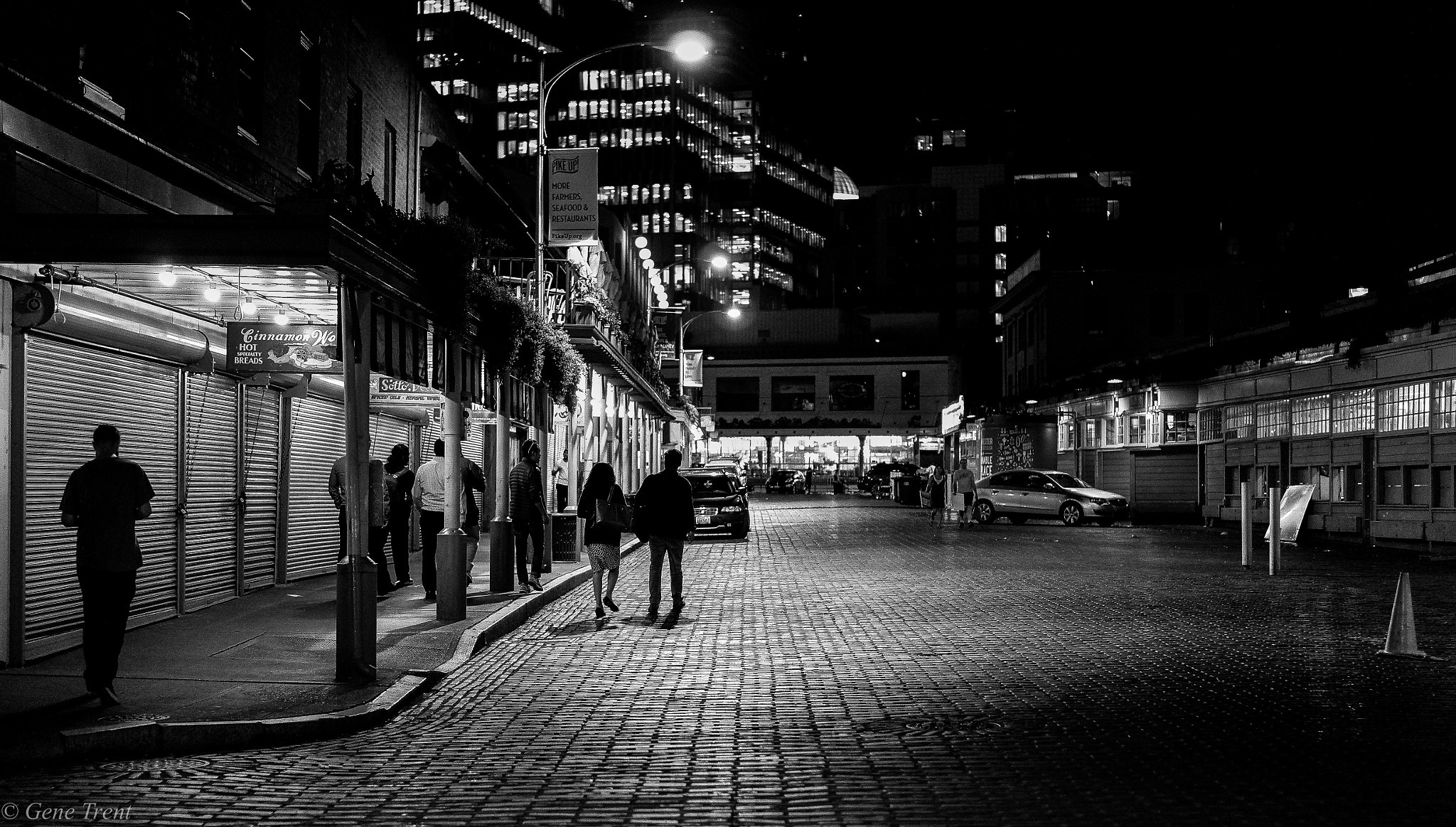Leica Summilux-TL 35mm F1.4 ASPH sample photo. Pike place market after dark. tourists out for a walk. photography