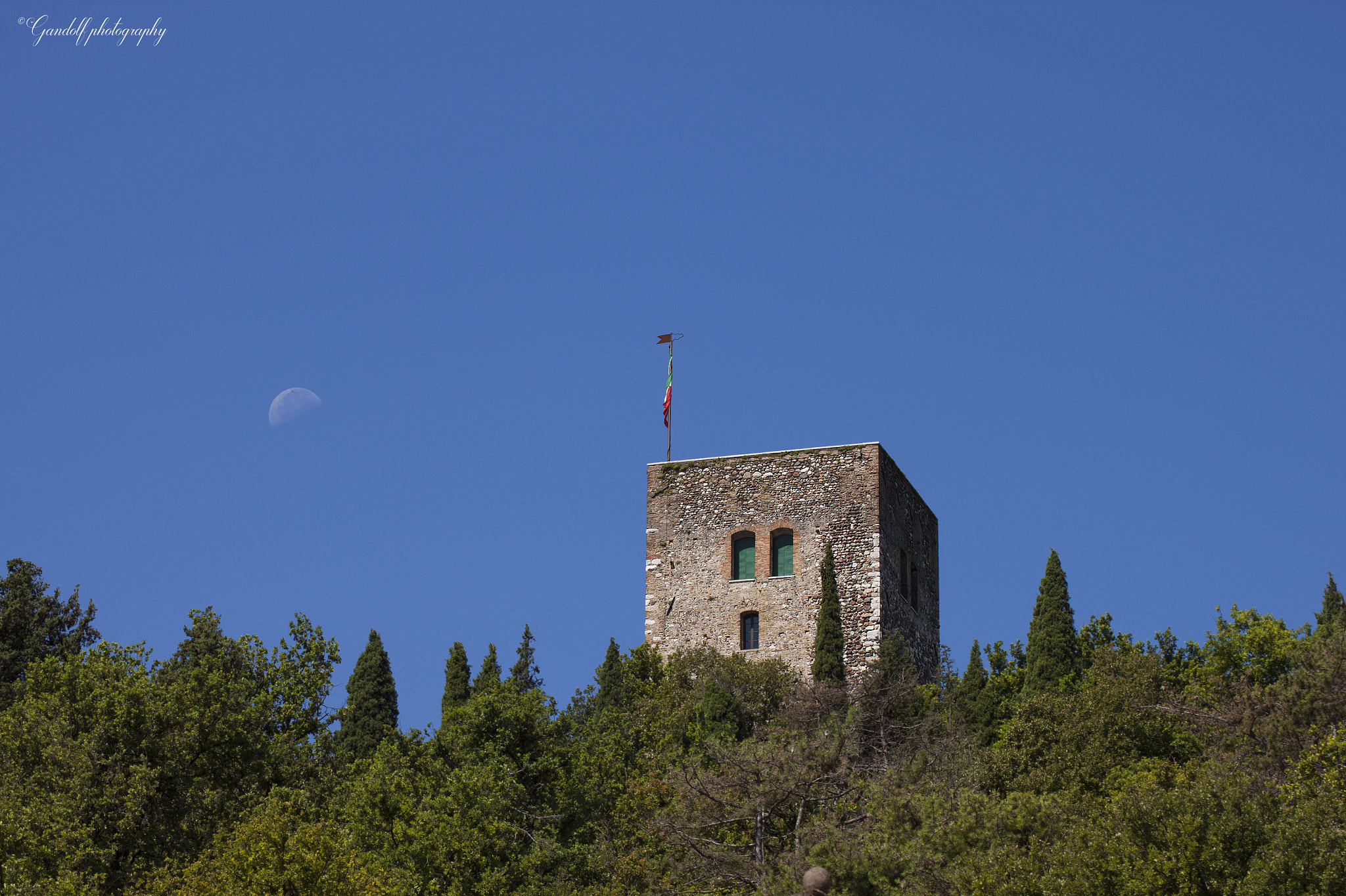 Canon EOS 500D (EOS Rebel T1i / EOS Kiss X3) + Tamron SP 70-300mm F4-5.6 Di VC USD sample photo. The tower and the moon photography