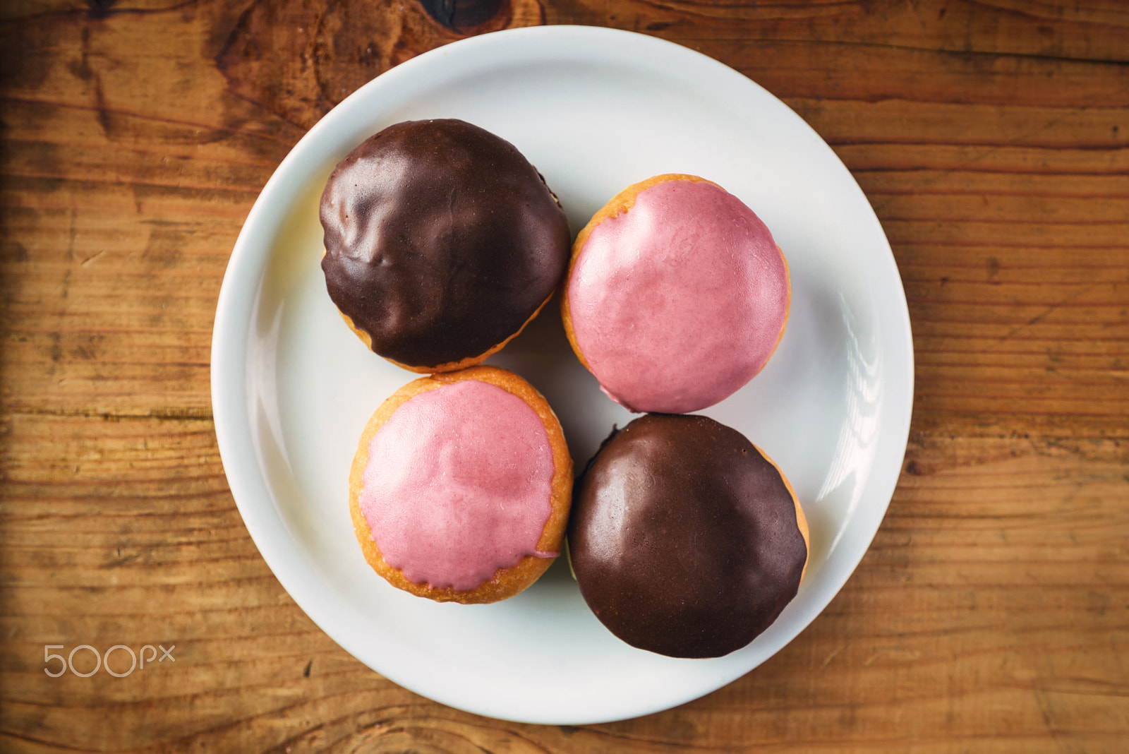 Tamron SP 15-30mm F2.8 Di VC USD sample photo. Donuts with sweet topping on a plate, top view photography