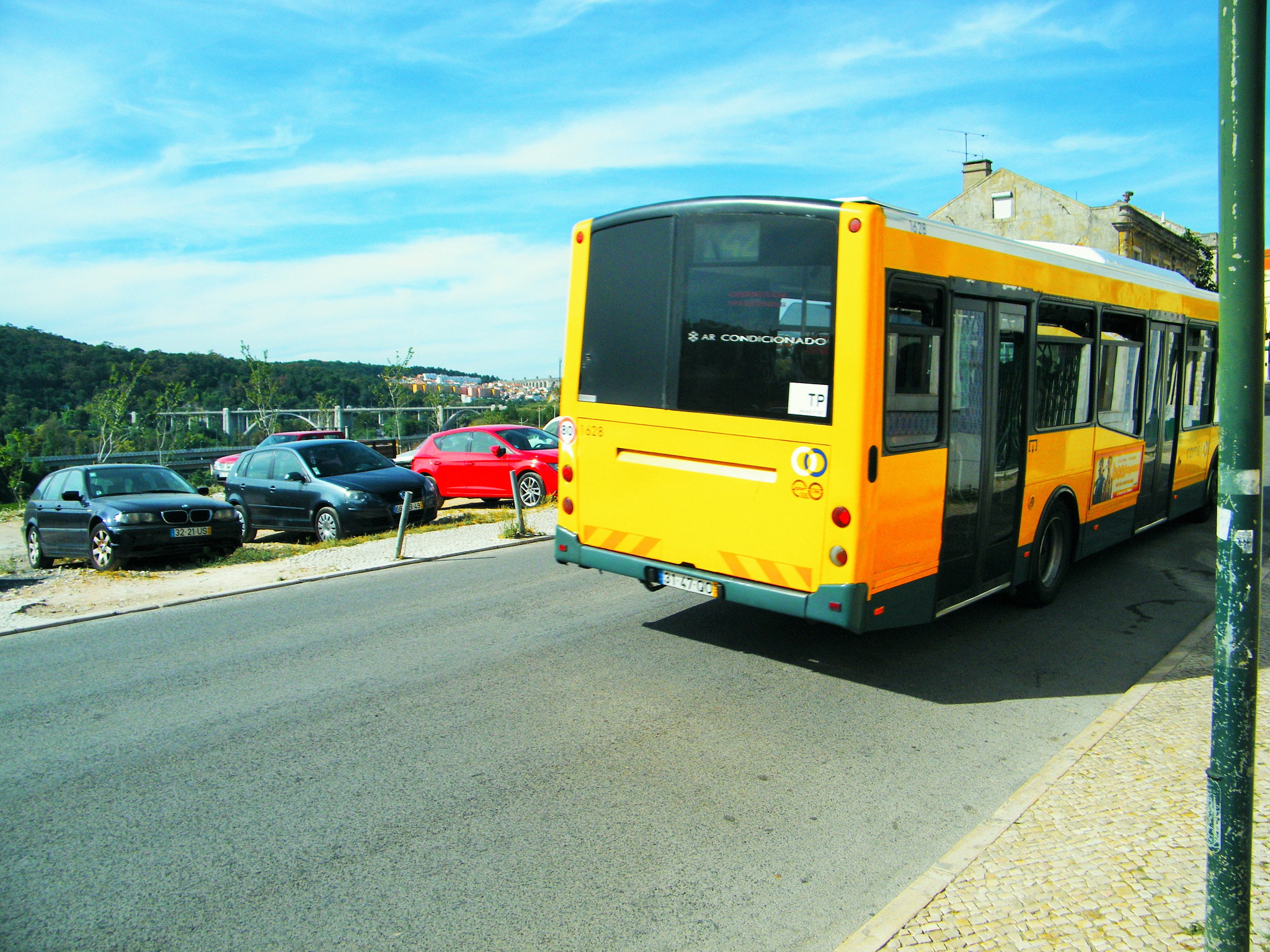 Fujifilm FinePix S2000HD sample photo. Run to catch the yellow bus photography