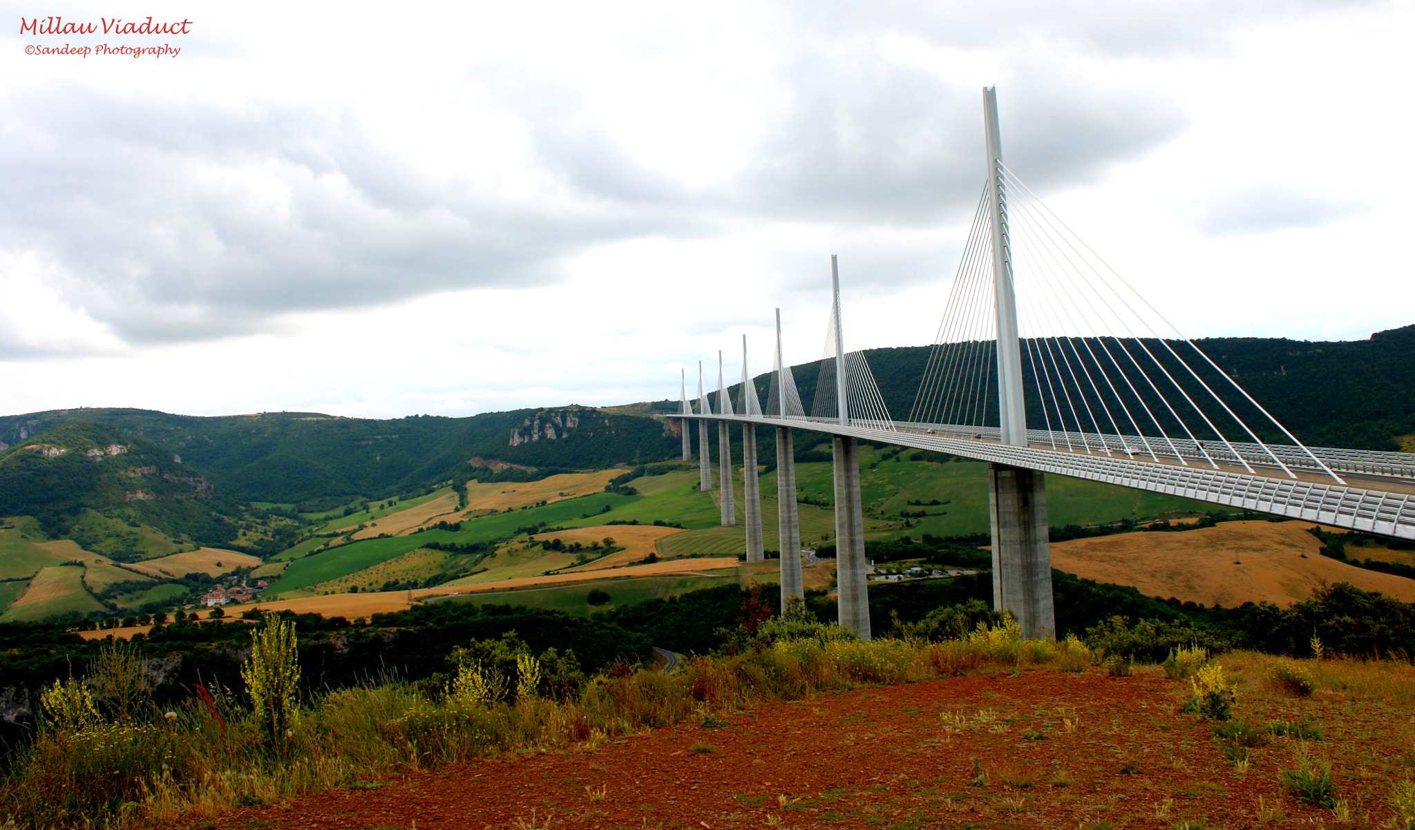 Canon EOS 750D (EOS Rebel T6i / EOS Kiss X8i) + Canon EF-S 18-55mm F3.5-5.6 IS sample photo. Millau viaduct ~ tallest of them all photography