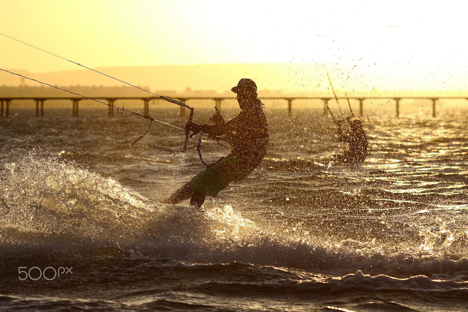 Canon EOS 7D Mark II + Canon EF 135mm F2L USM sample photo. Kiteboarder sportsman water splash photography
