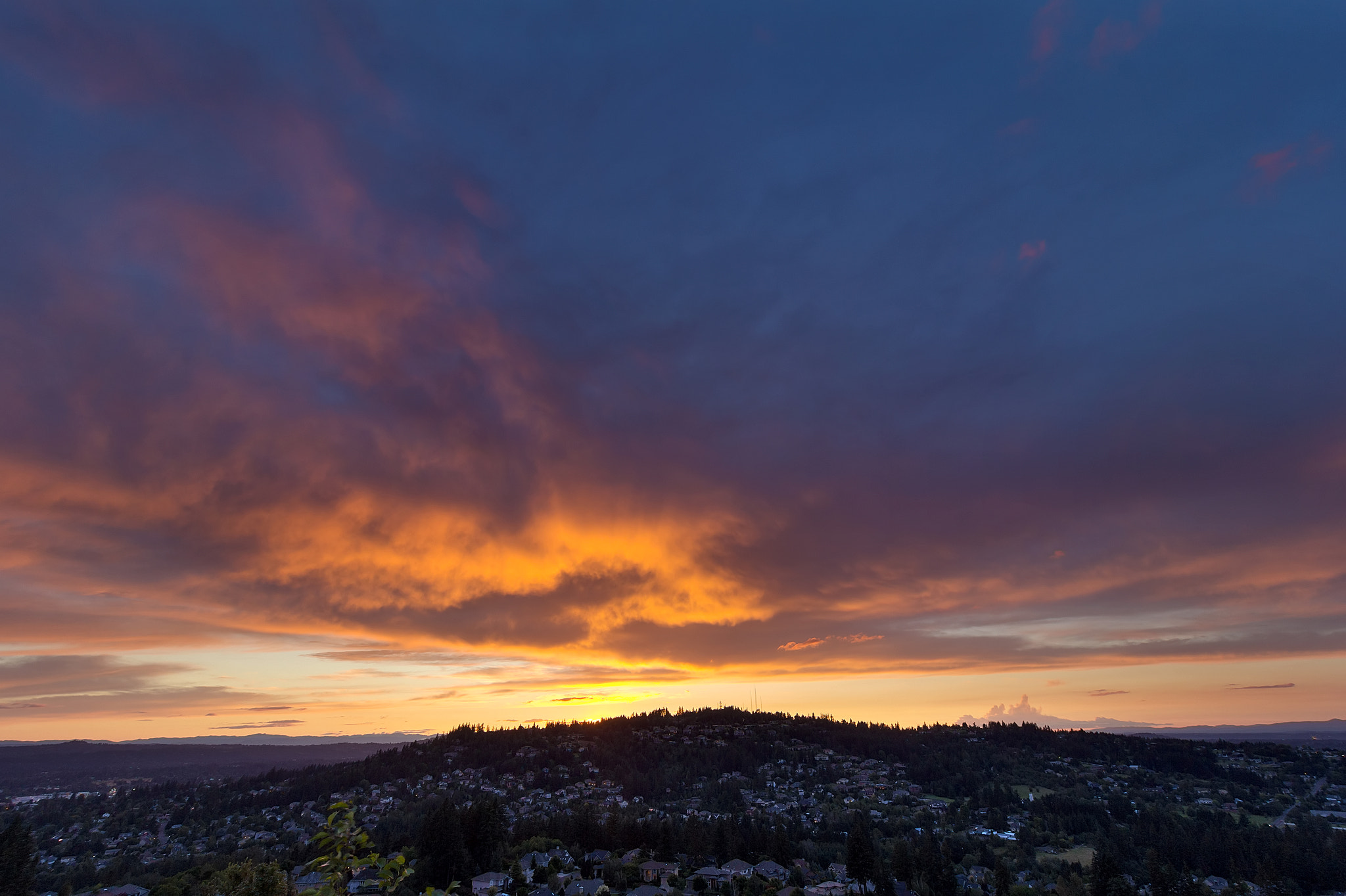 Canon EOS 60D + Canon EF-S 10-18mm F4.5–5.6 IS STM sample photo. Stormy fiery sunset sky over happy valley photography