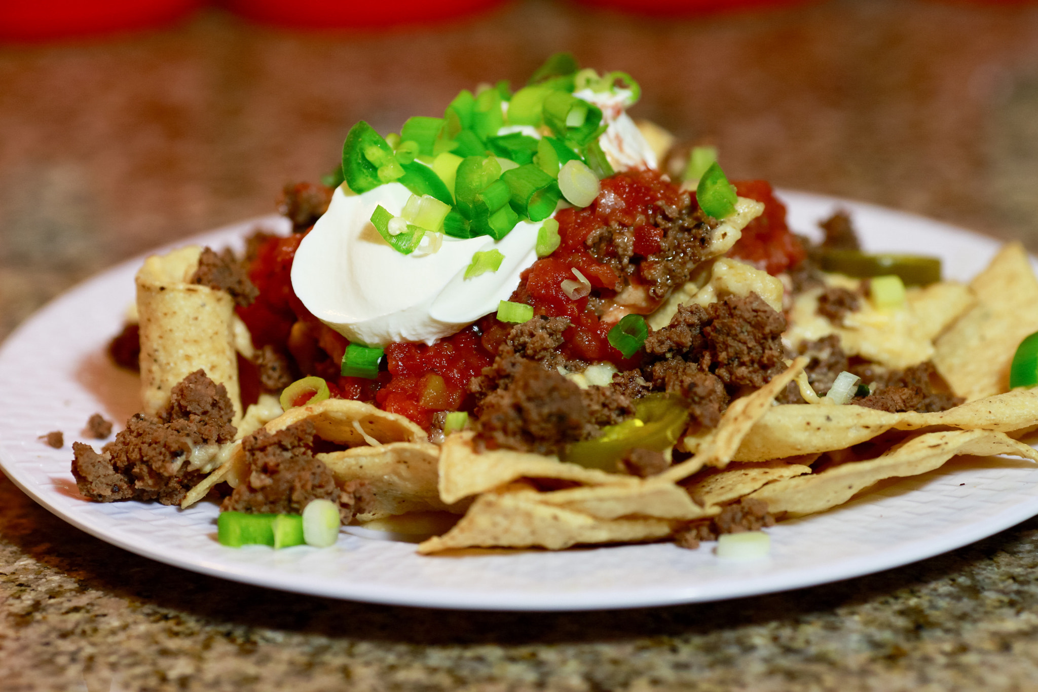 Canon EF 135mm F2L USM sample photo. Nacho cheese and tortilla chips photography