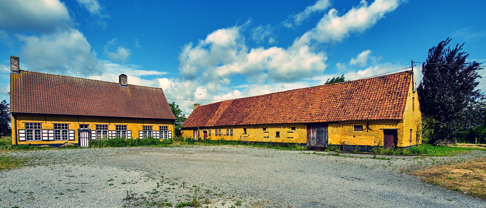 Sony ILCA-77M2 + 10-20mm F3.5 sample photo. Yellow brick home photography