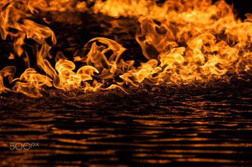 Canon EOS 450D (EOS Rebel XSi / EOS Kiss X2) + Canon EF-S 55-250mm F4-5.6 IS sample photo. Fire on water photography