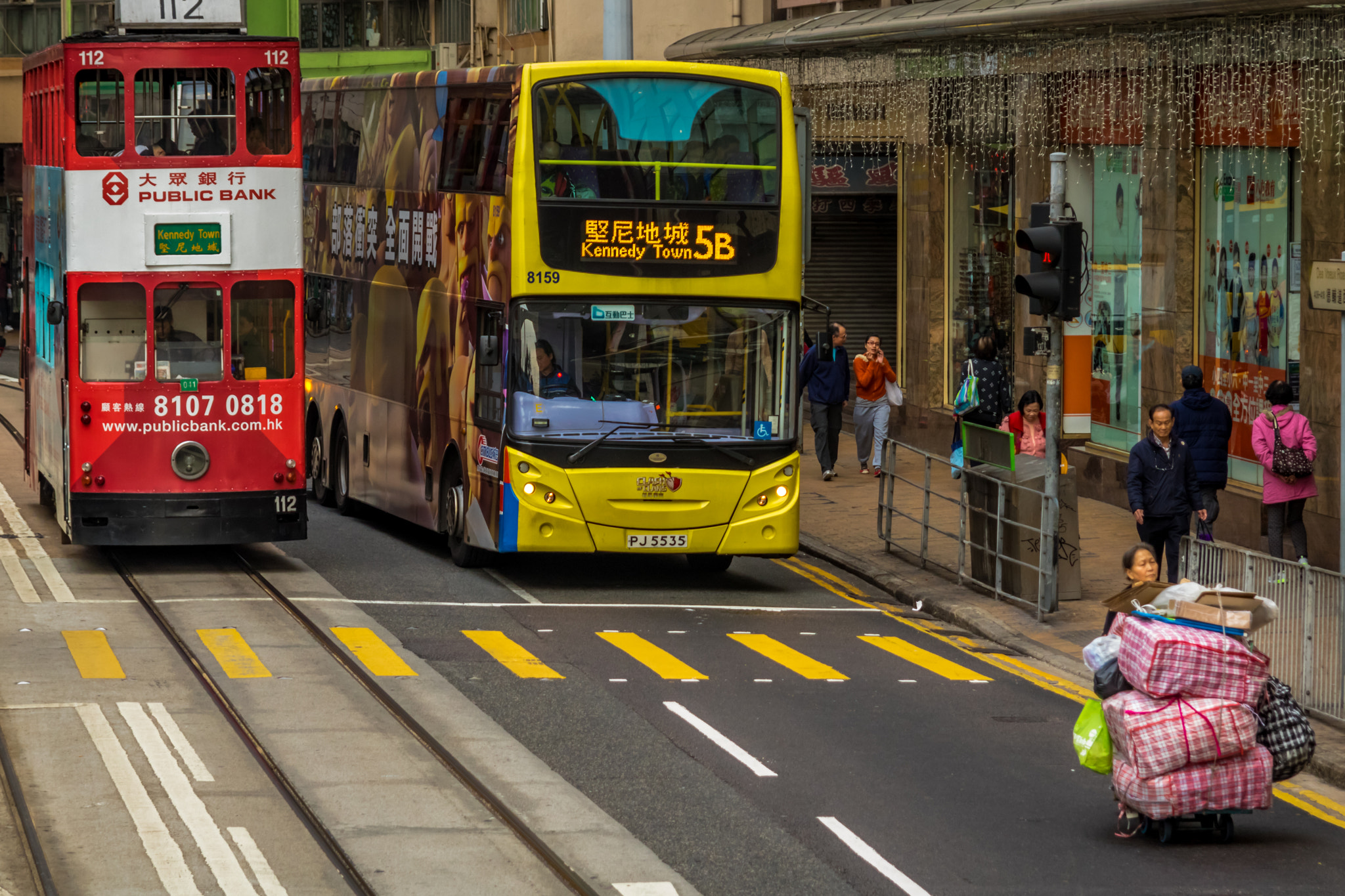 Canon EF 24-85mm F3.5-4.5 USM sample photo. Hong kong street : a bus, a tramway, an old woman photography