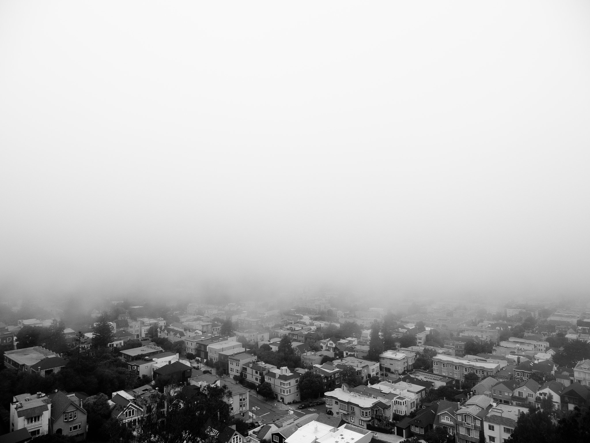 Panasonic Lumix DMC-GX7 sample photo. Fog over the city photography