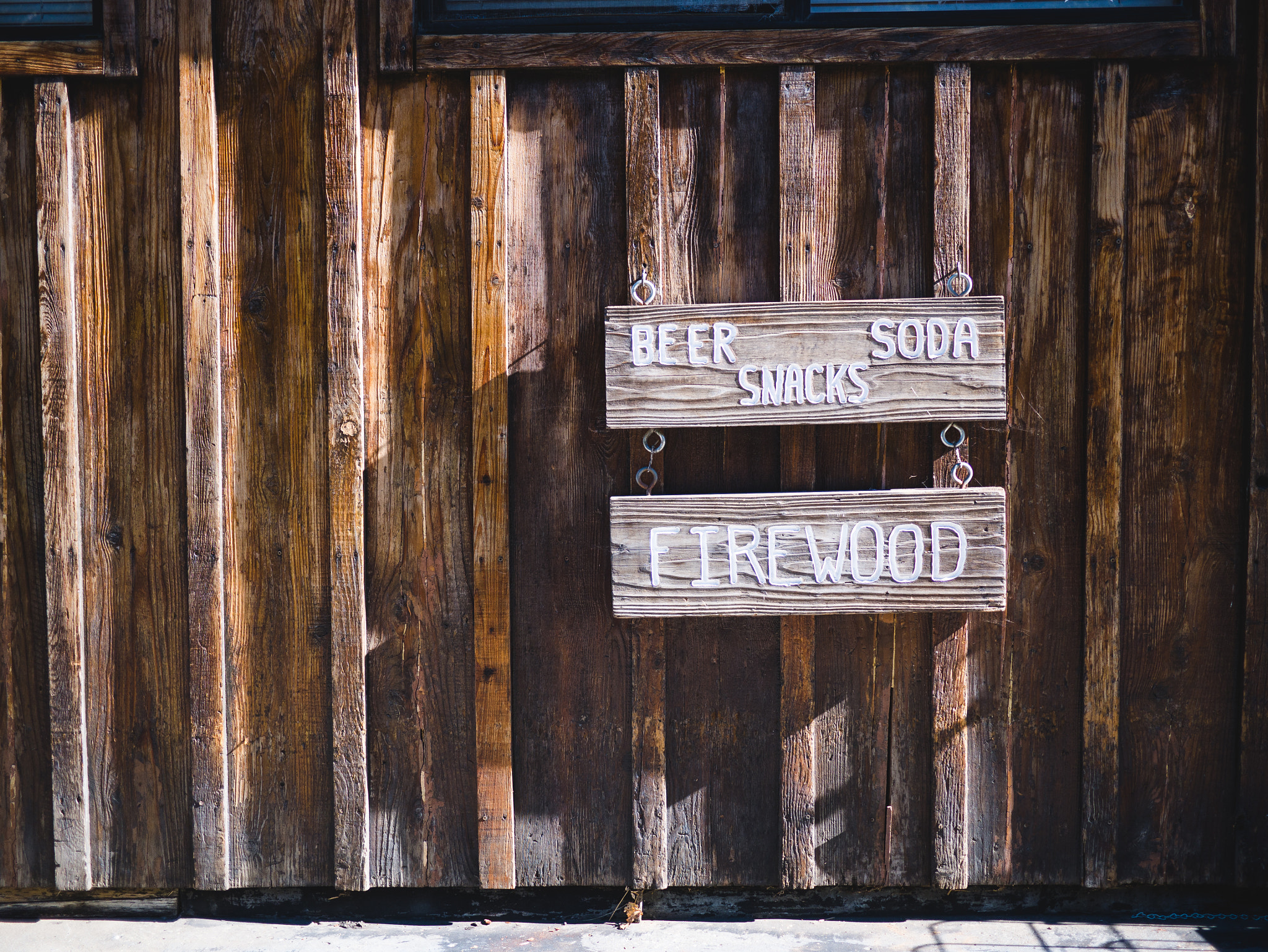 Panasonic Lumix DMC-GX7 + Panasonic Lumix G 20mm F1.7 ASPH sample photo. Beer. soda. snacks. firewood. photography