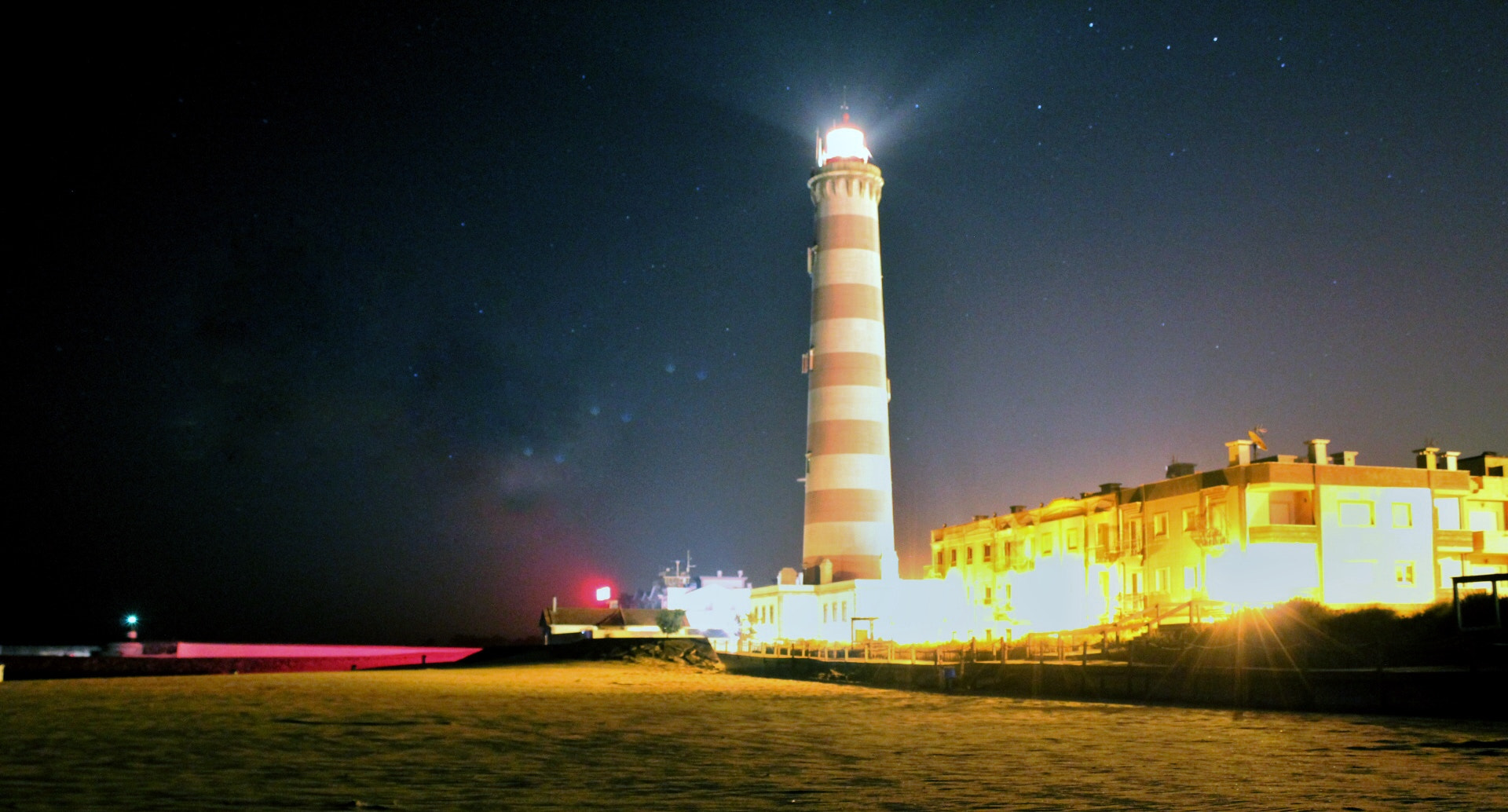 Canon EF-S 18-55mm F3.5-5.6 III sample photo. The amazing lighthouse at praia da barra in aveiro photography