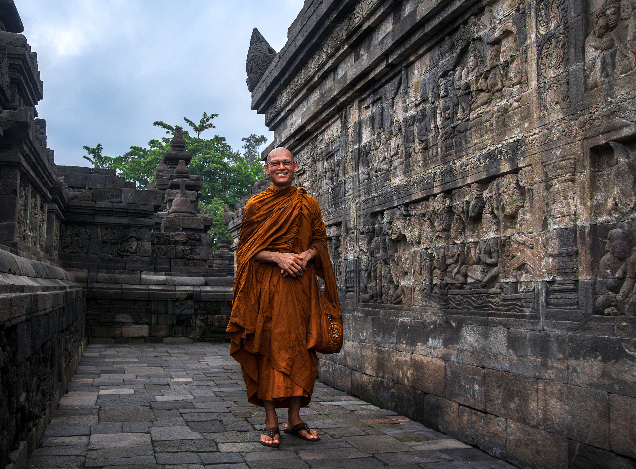 Nikon D7100 + Sigma 18-50mm F2.8 EX DC Macro sample photo. Monk posing at borobudur temple photography