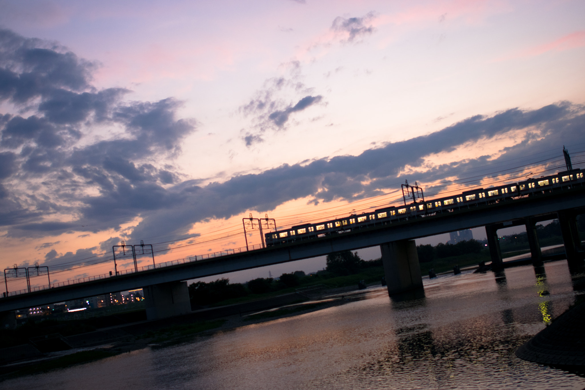Nikon D5300 + Nikon AF-S Nikkor 28mm F1.8G sample photo. Train on the bridge in the sunset photography