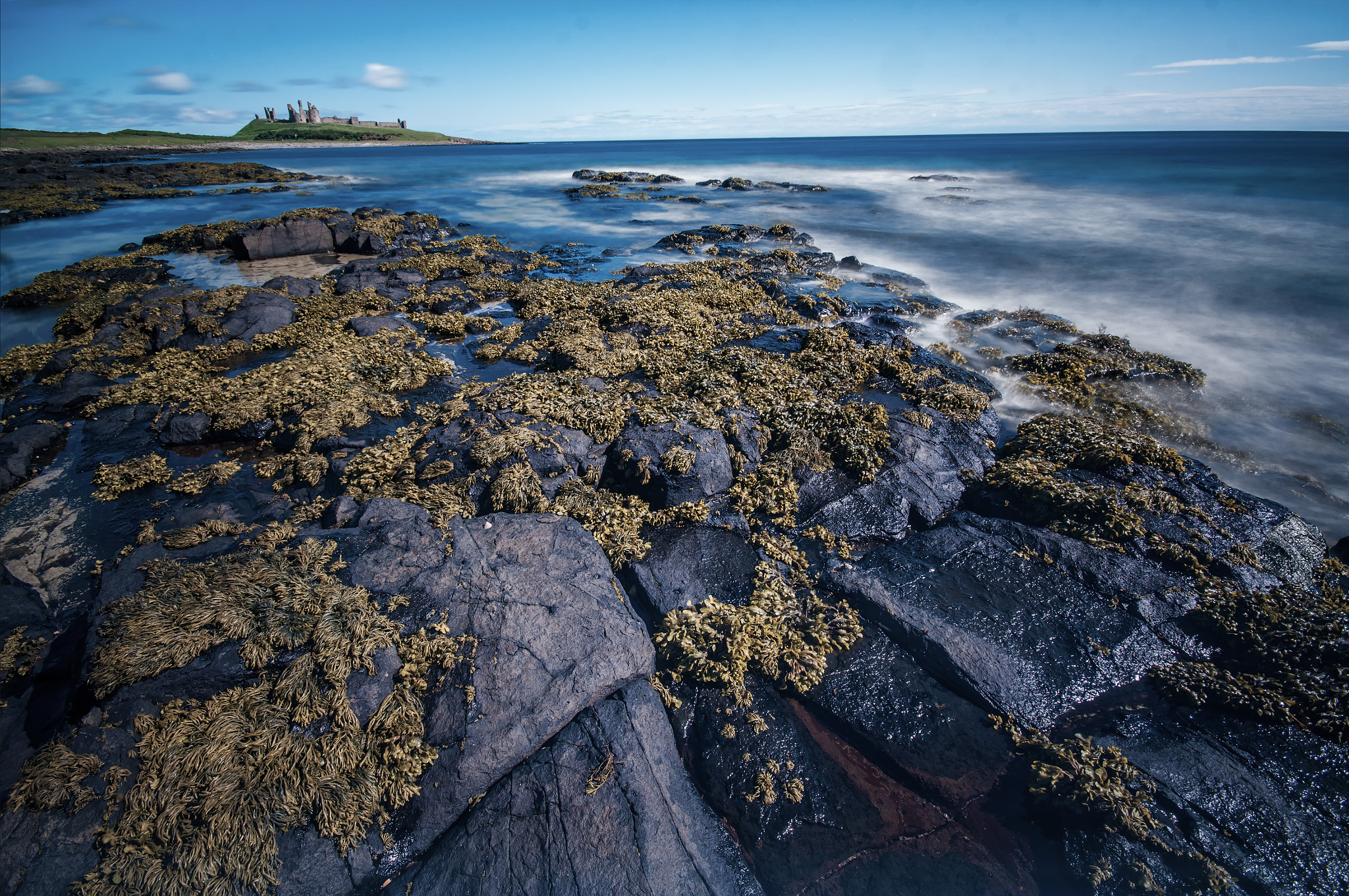 Sigma AF 10-20mm F4-5.6 EX DC sample photo. Dunstanburgh castle photography