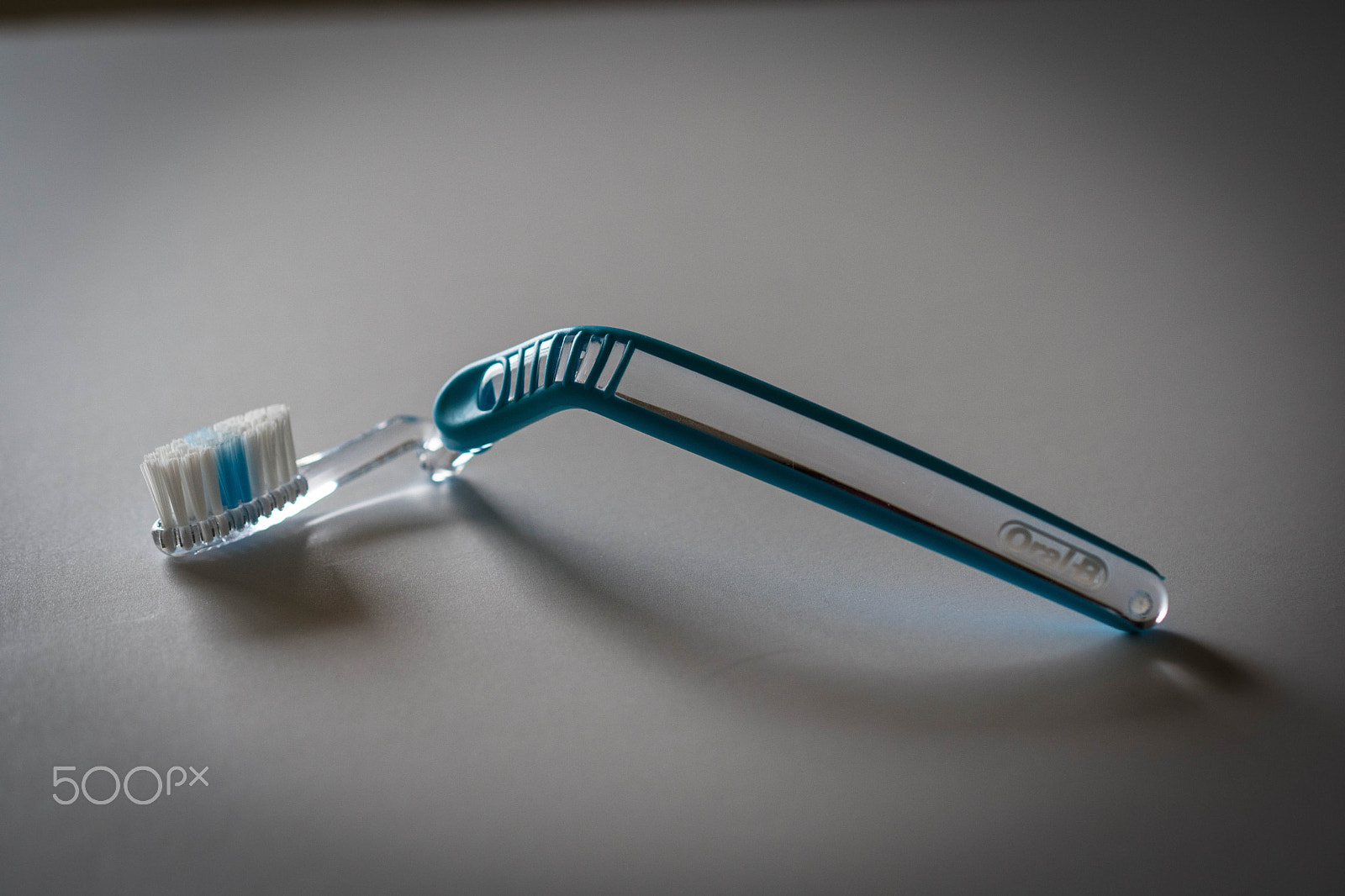 Nikon AF-S DX Micro Nikkor 40mm F2.8 sample photo. Agony of a toothbrush photography